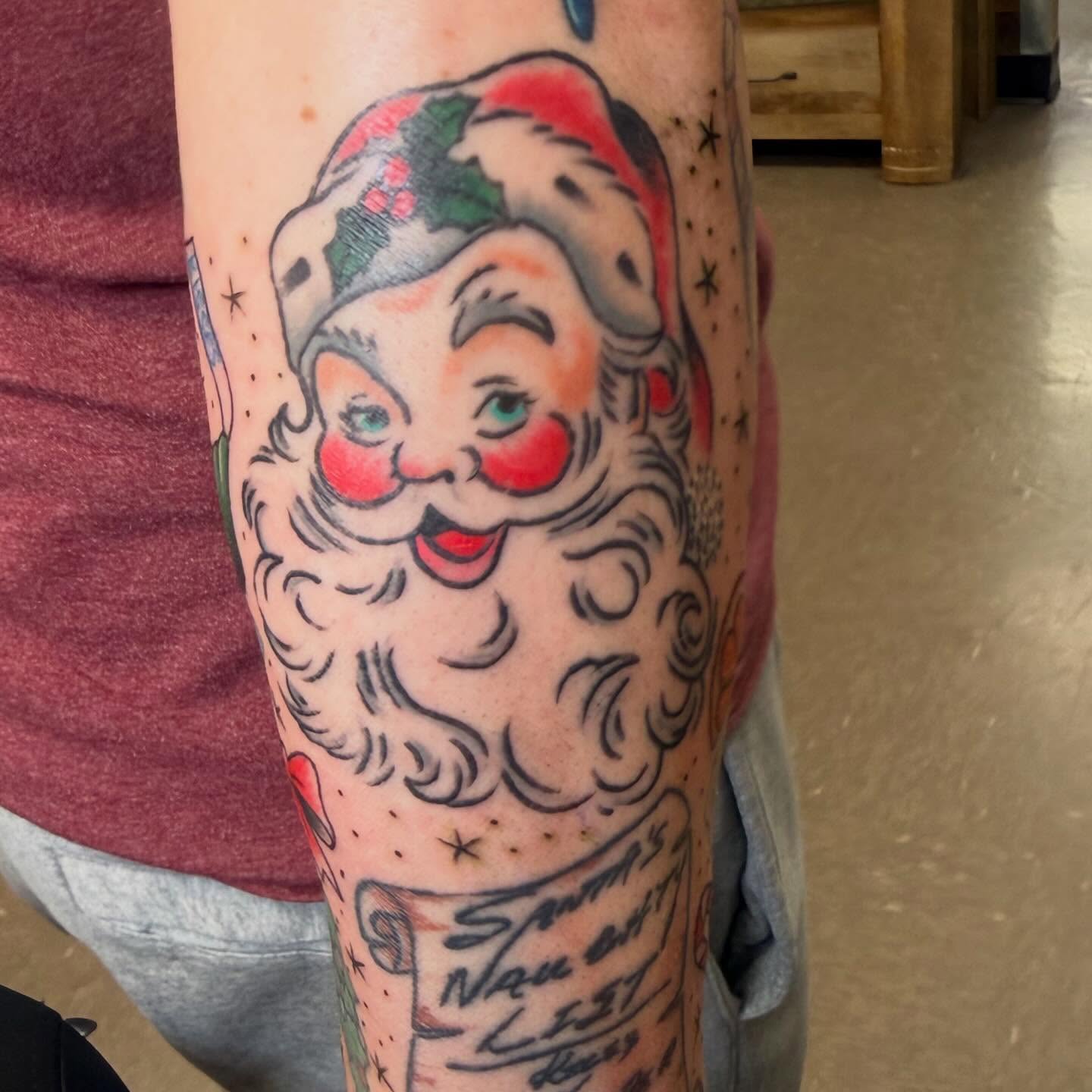 Santa Claus American traditional tattoo on the forearm by ArJay Smith