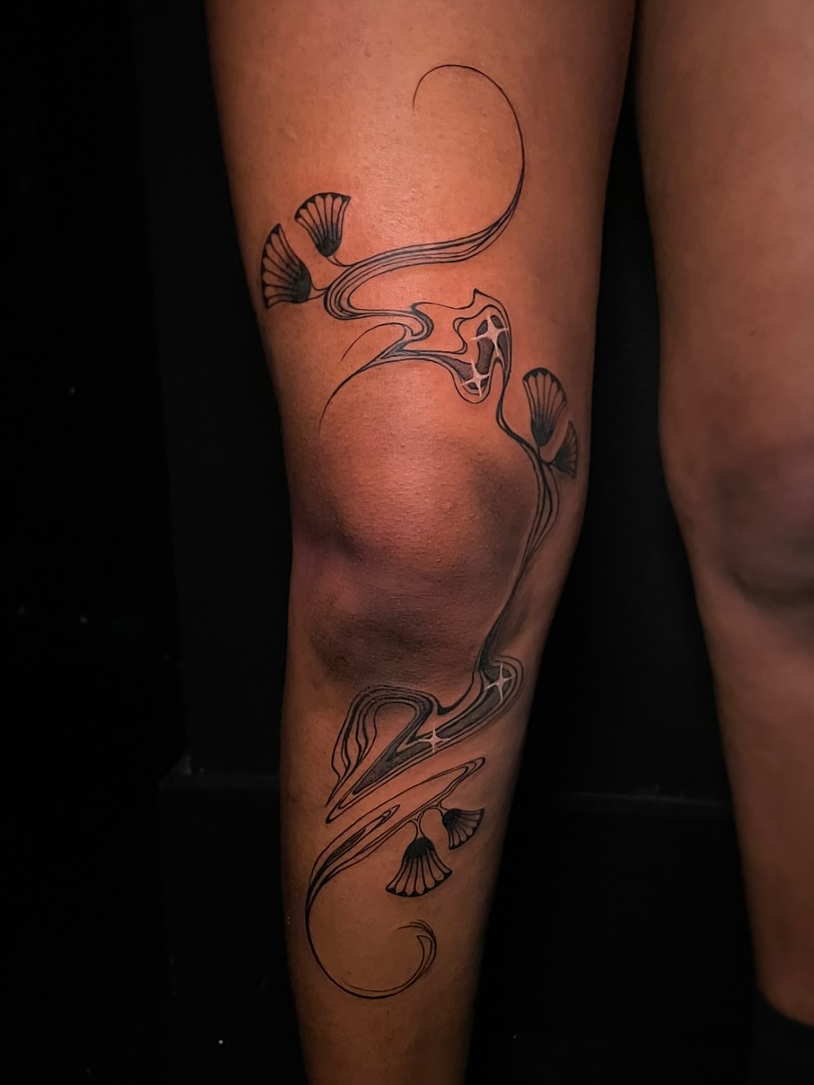 Abstract floral design black and grey tattoo on the calf by 𝕲𝖗𝖆𝖈𝖊 🥀 ᴛᴀᴛᴛᴏᴏ