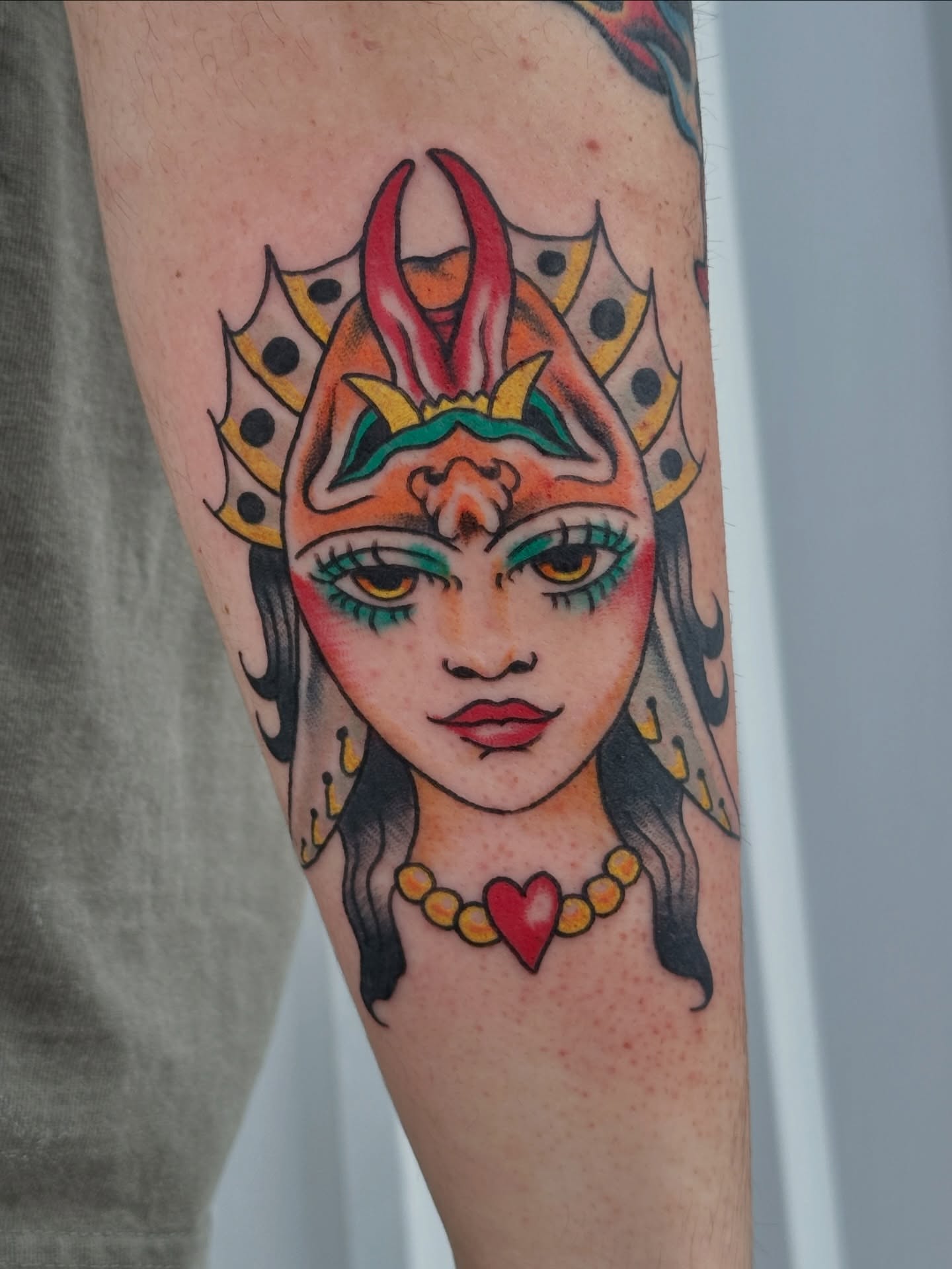 Woman with headdress American traditional tattoo on the forearm by julian solis, Houston, Texas