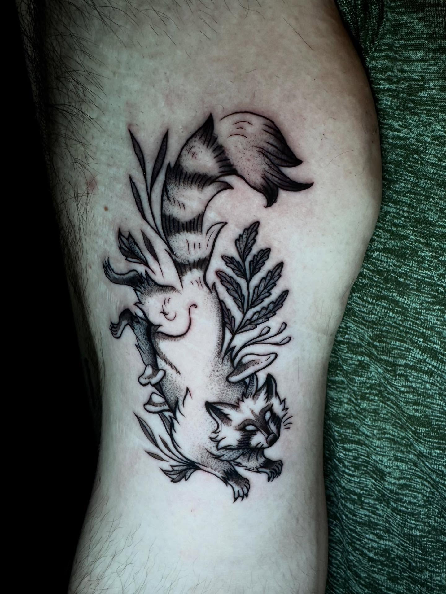 Cat and bird black and grey tattoo on the forearm by Morgan Peeples