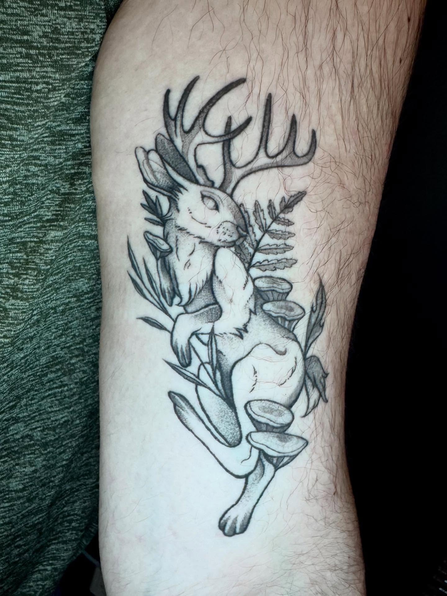 Deer and rabbit dotwork tattoo on the forearm by Morgan Peeples