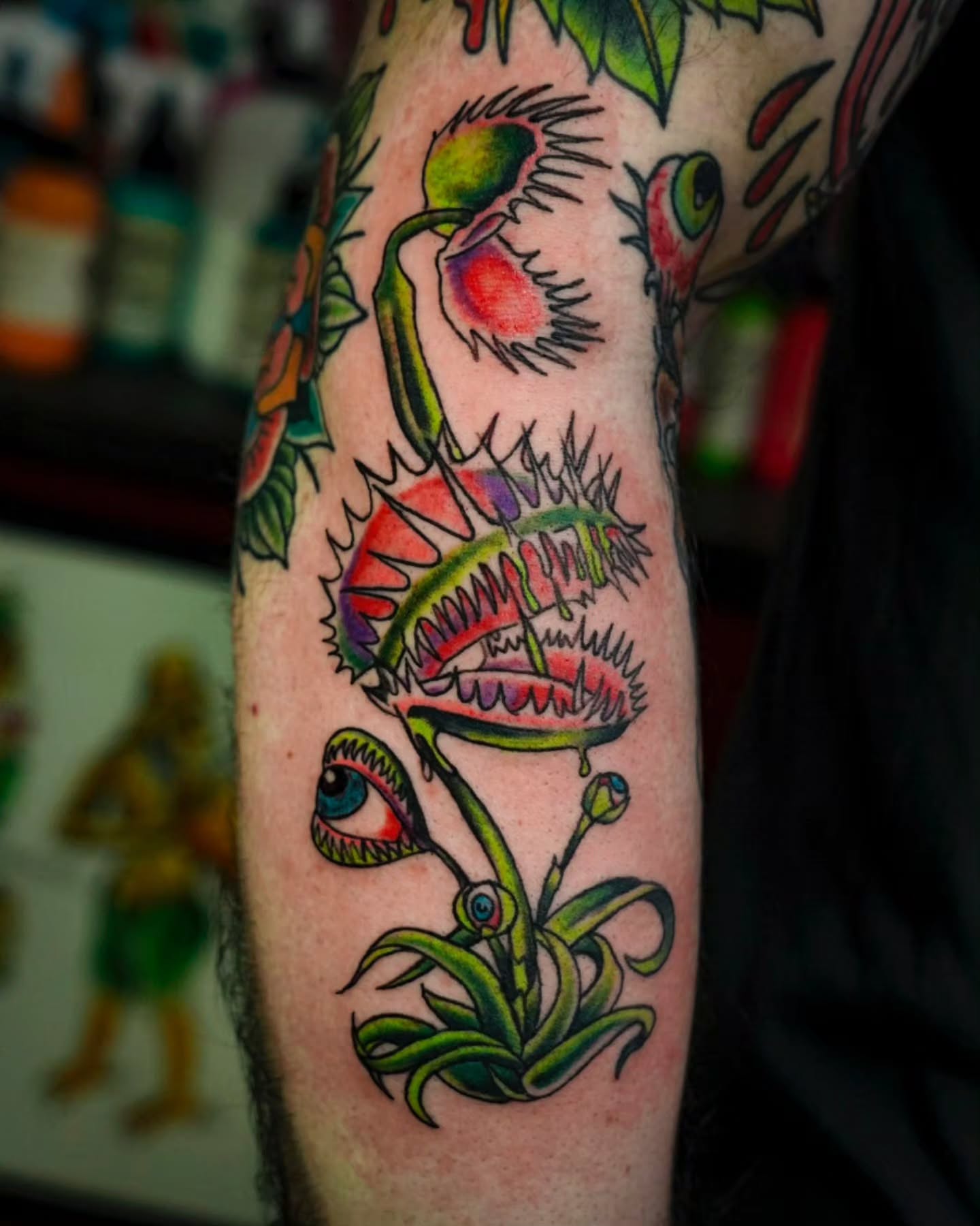 Venus flytrap American traditional tattoo on the forearm by Spicoli