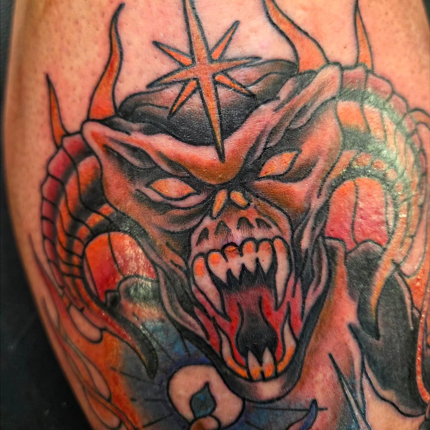 Demon dark realism tattoo on the forearm by Kat Coniglio Art