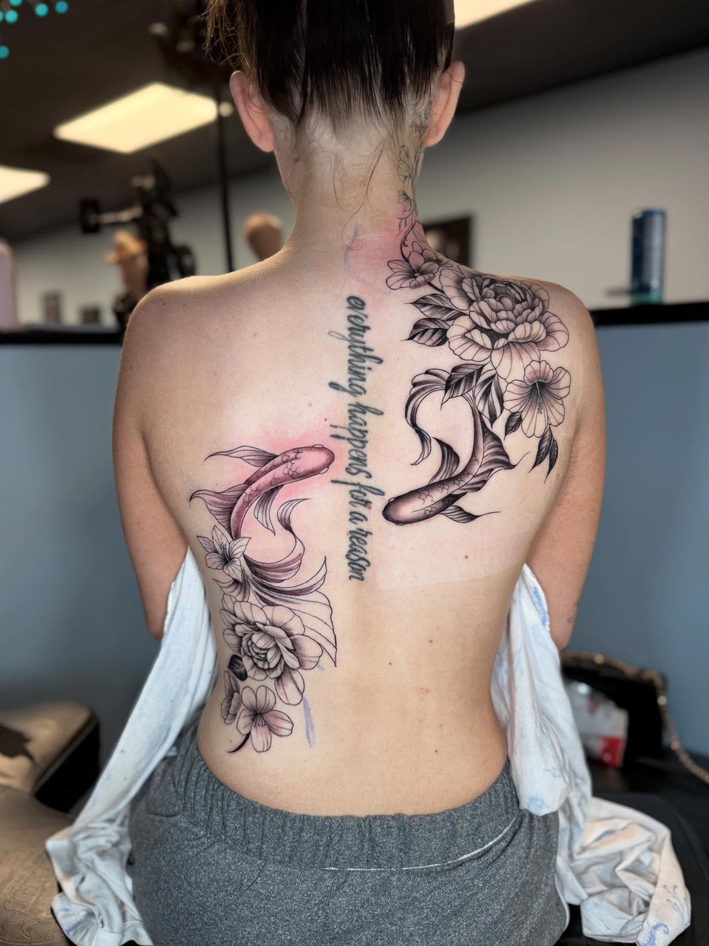 Koi fish and flowers japanese irezumi tattoo on the back by Stilow Memphis Tattoo Artist, Memphis, Tennessee