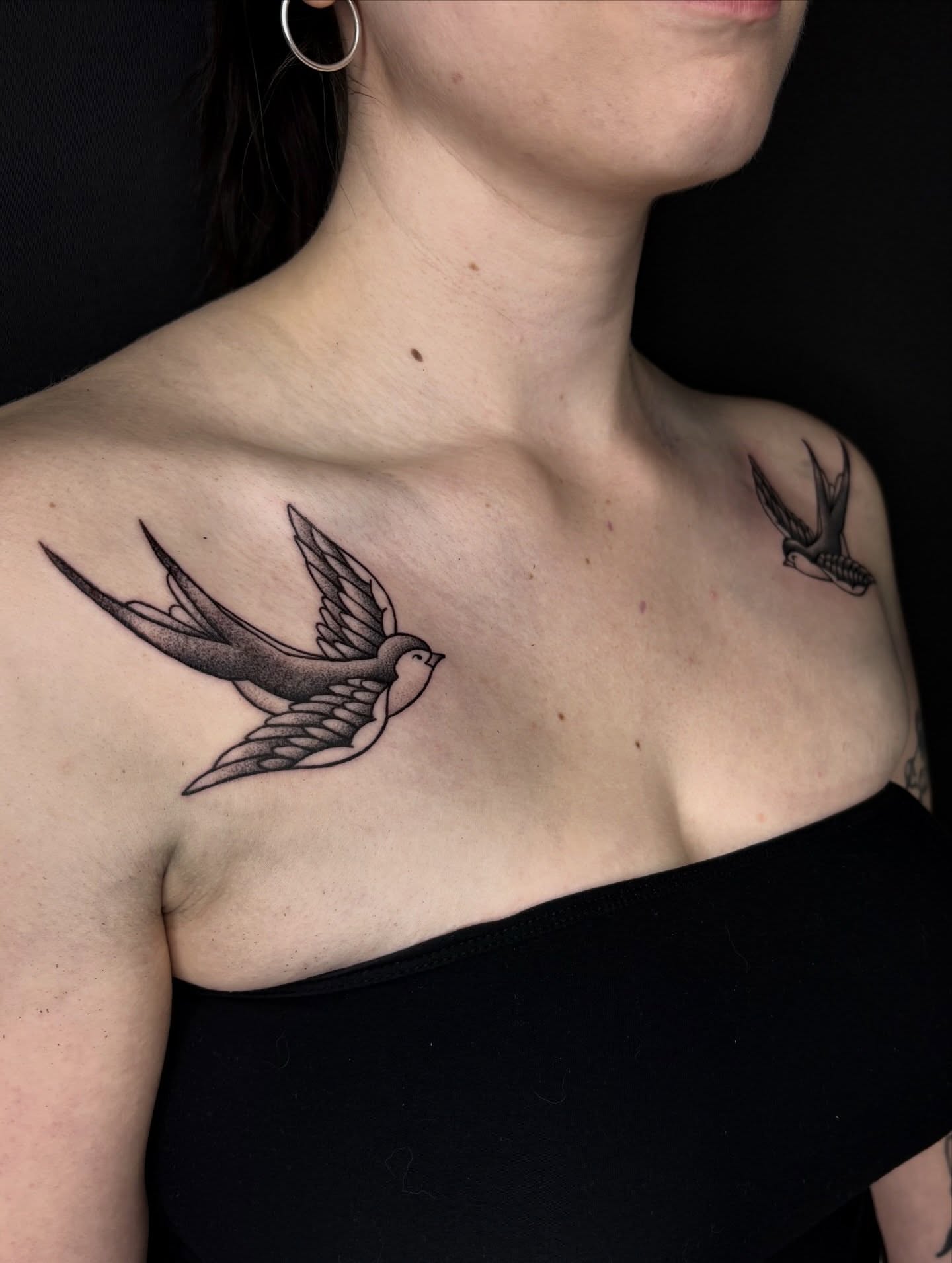 Swallows black and grey tattoo on the chest by Soorya ✨Seattle Tattoo Artist✨