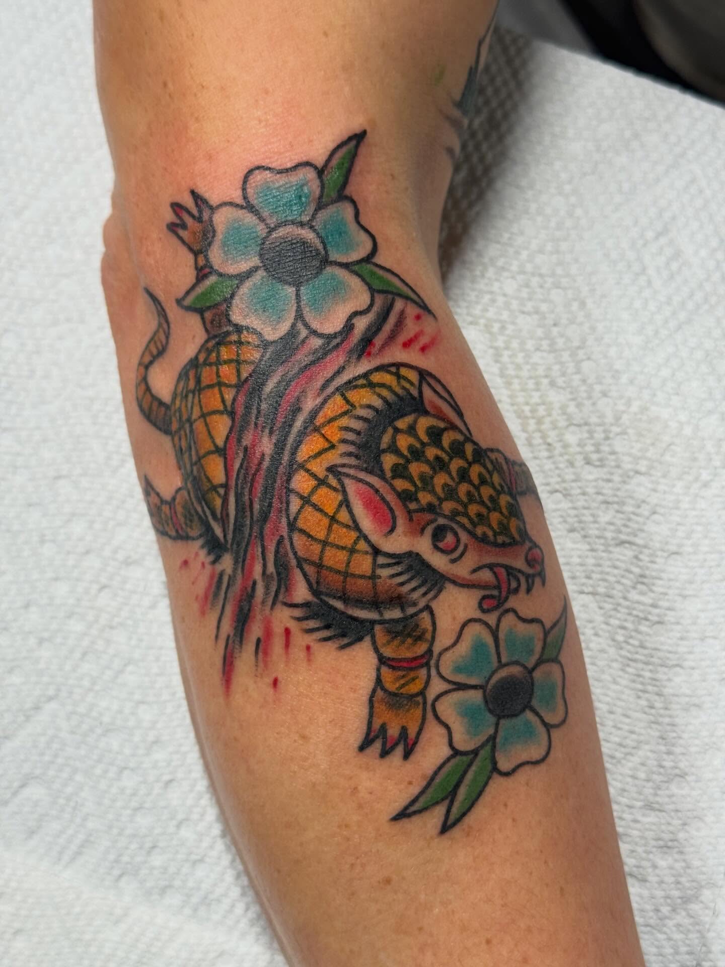 Armadillo and flowers American traditional tattoo on the forearm by Eric James, Columbus, Ohio