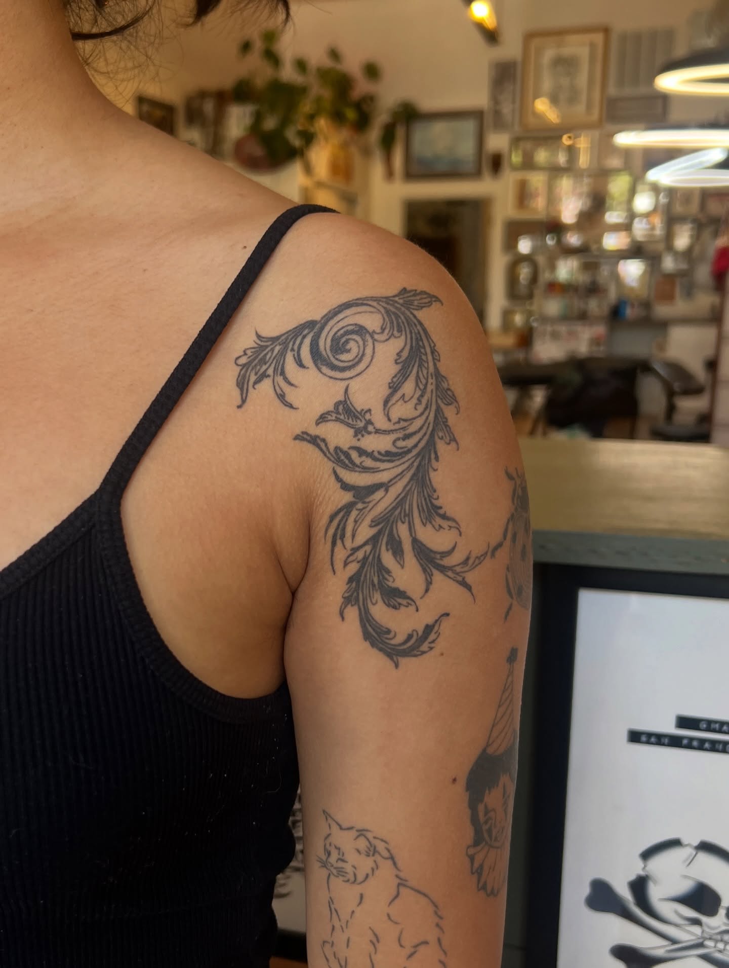 Scrollwork ornamental tattoo on the shoulder by @syrenbier, San Francisco, California