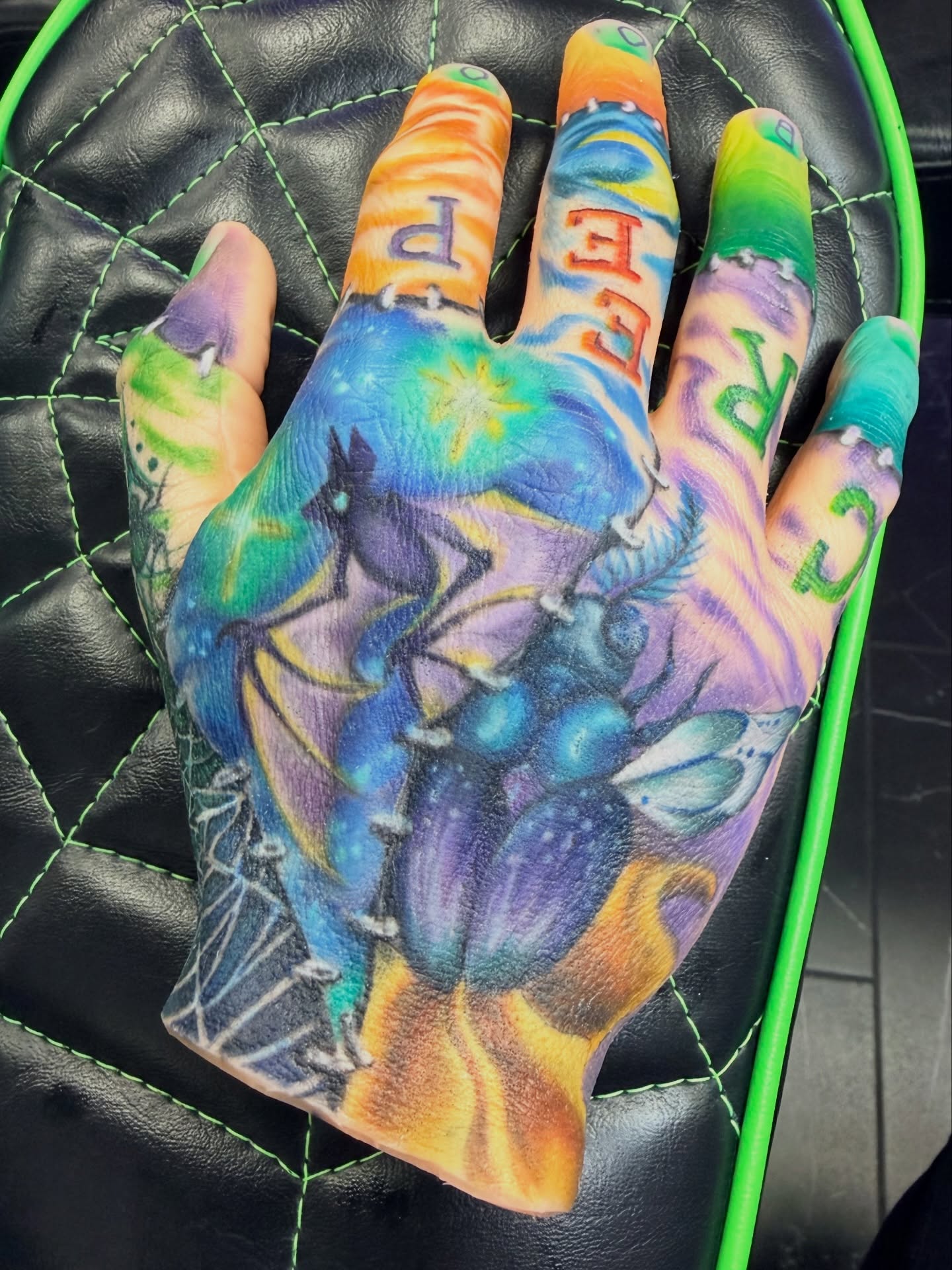 Insect realism tattoo on the hand by Stephanie Comito-Stephens