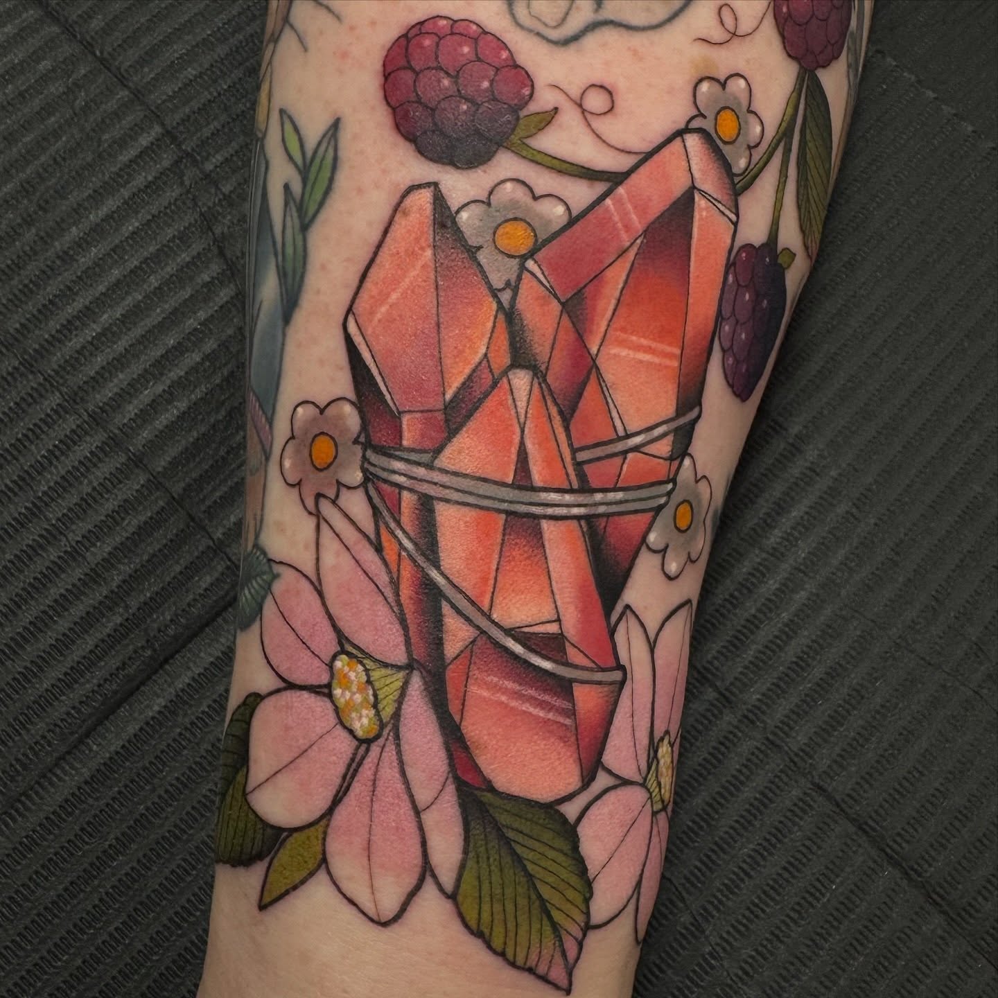 Geometric crystal geometric tattoo on the forearm by Kaley, Des Moines, Iowa