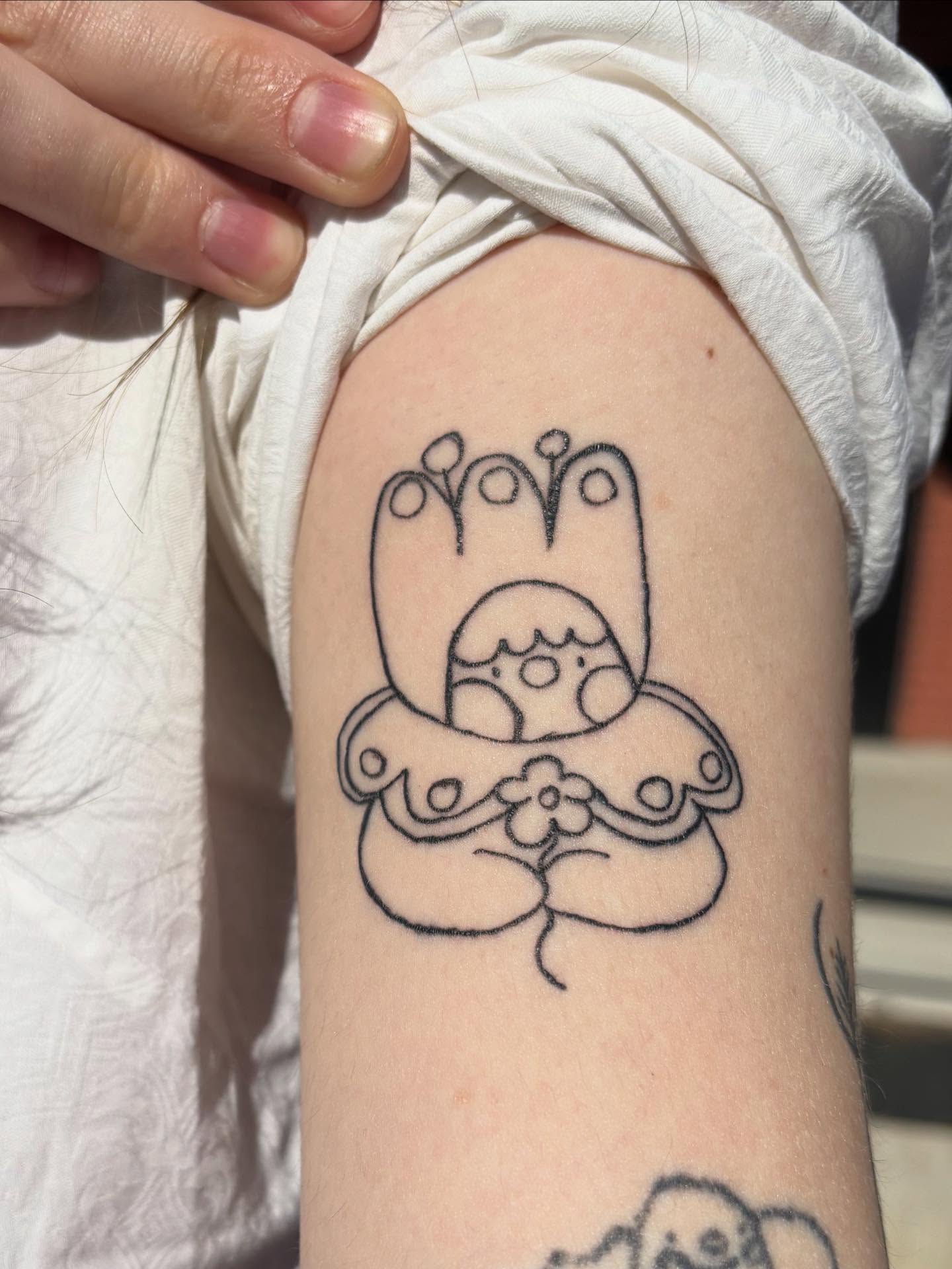 Crown and flower black and grey tattoo on the forearm by riley