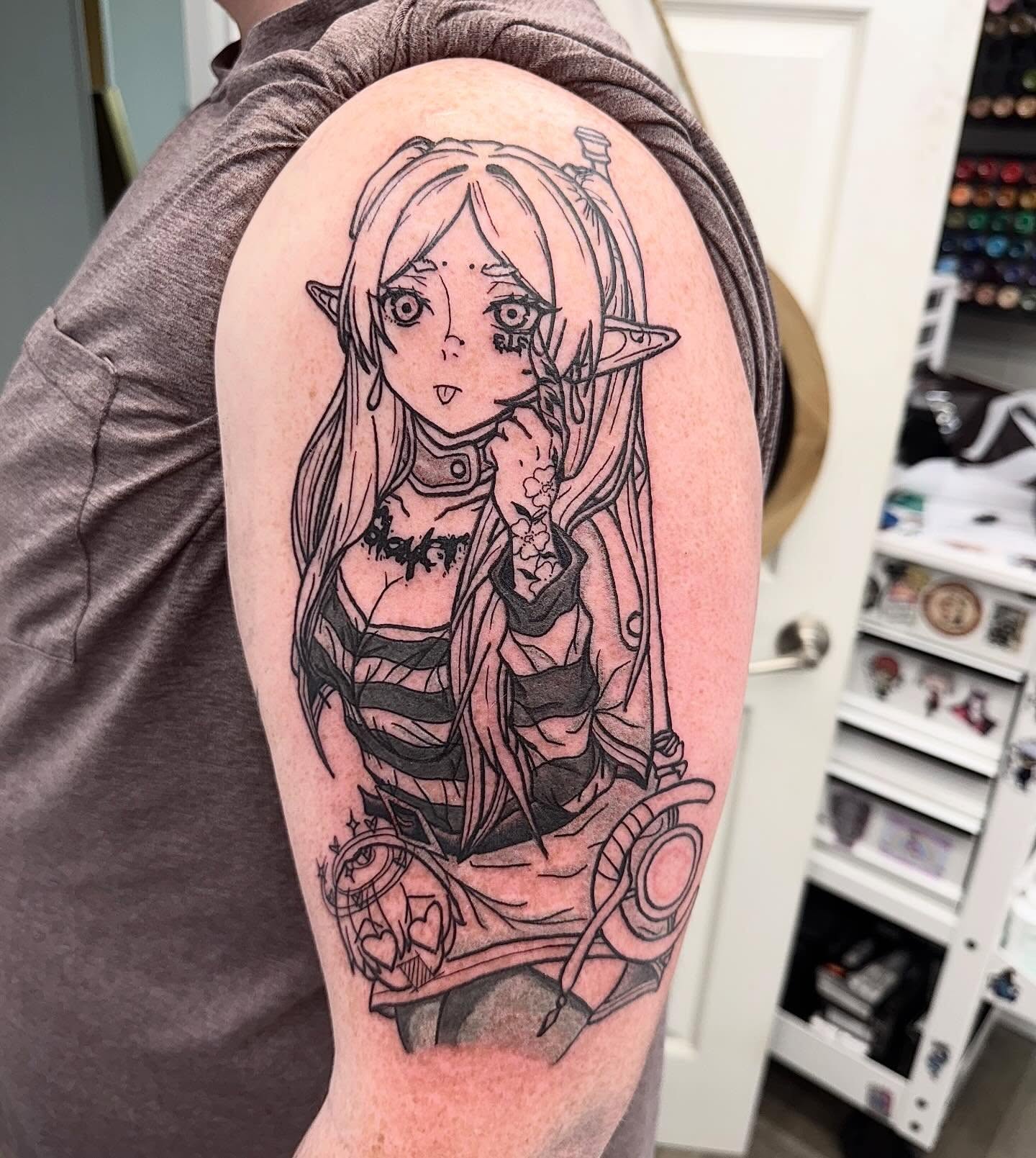 Elf girl anime tattoo on the upper arm by Abby Ash, Belington, West Virginia
