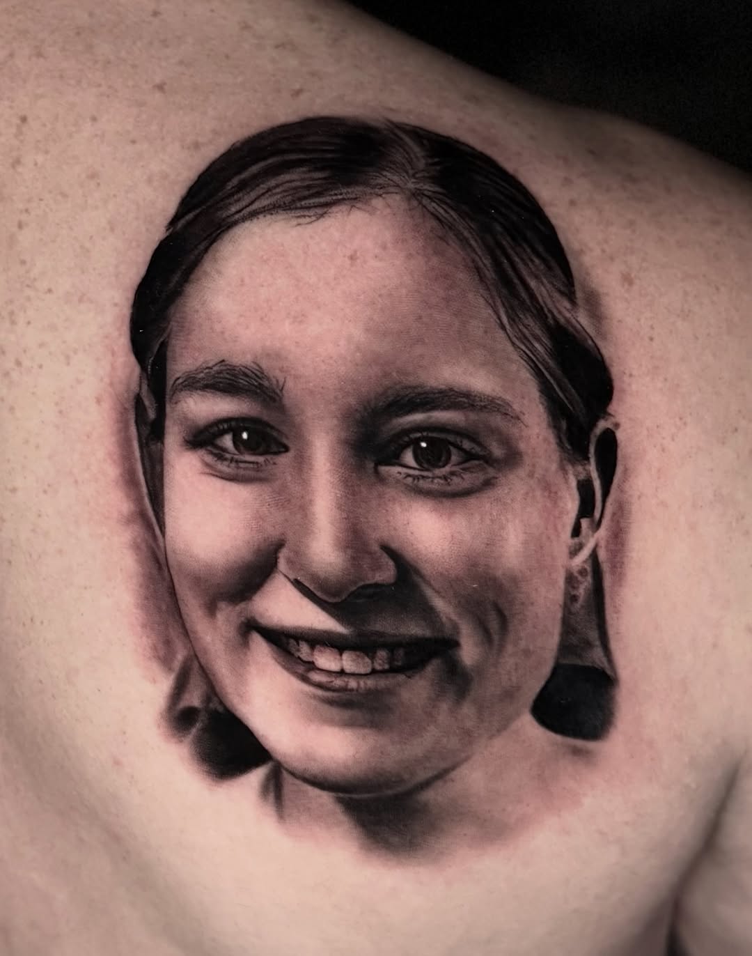 Portrait of a young woman realism tattoo on the shoulder by ππ―ππ³π¦π° πππͺπ¬π«π±