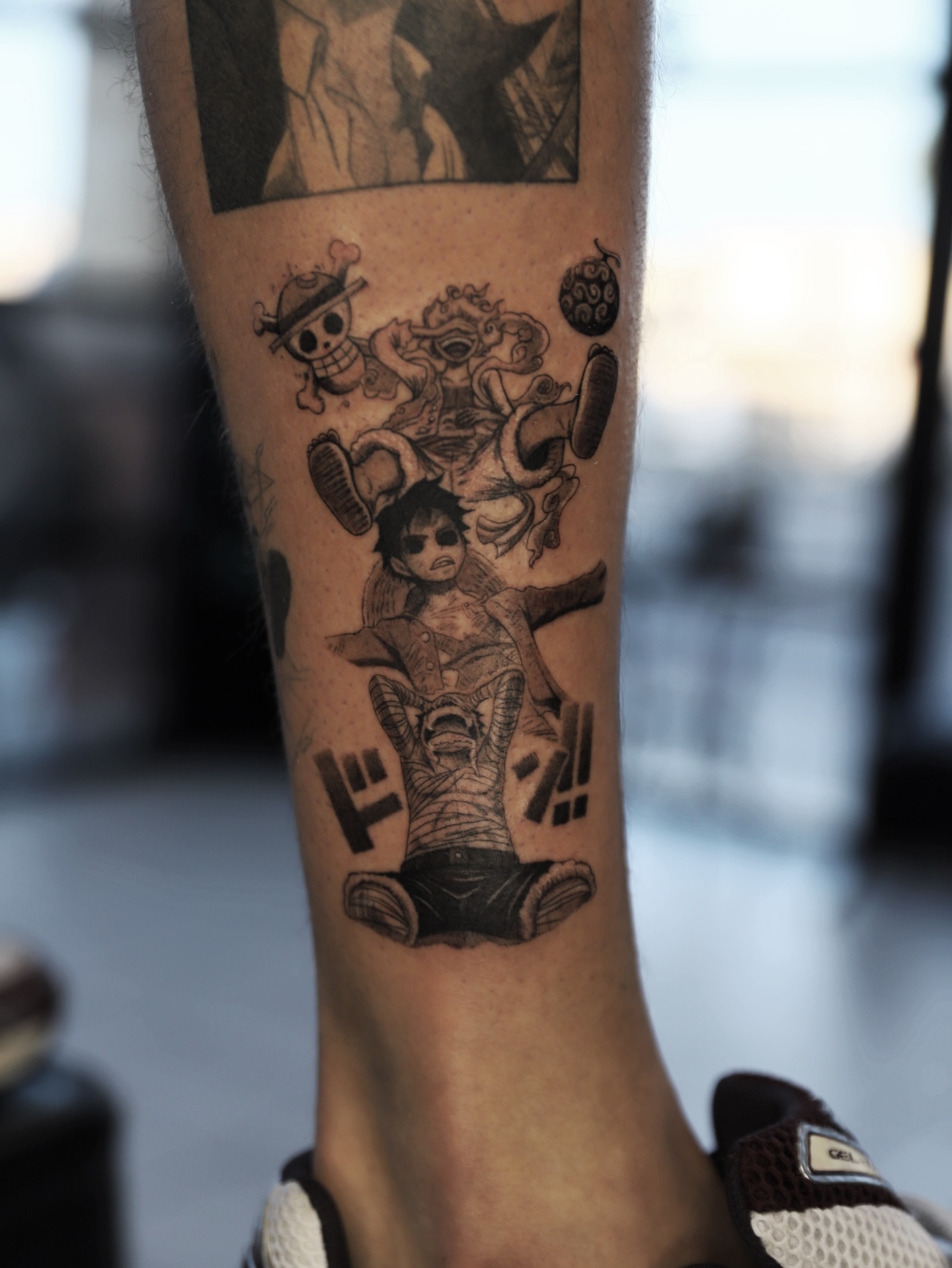 Anime characters anime tattoo on the forearm by Las Vegas tattoo