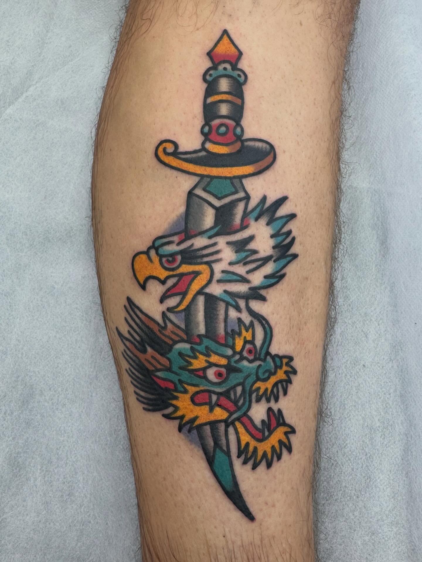 Dragon and sword American traditional tattoo on the forearm by Oldschool Tattooer