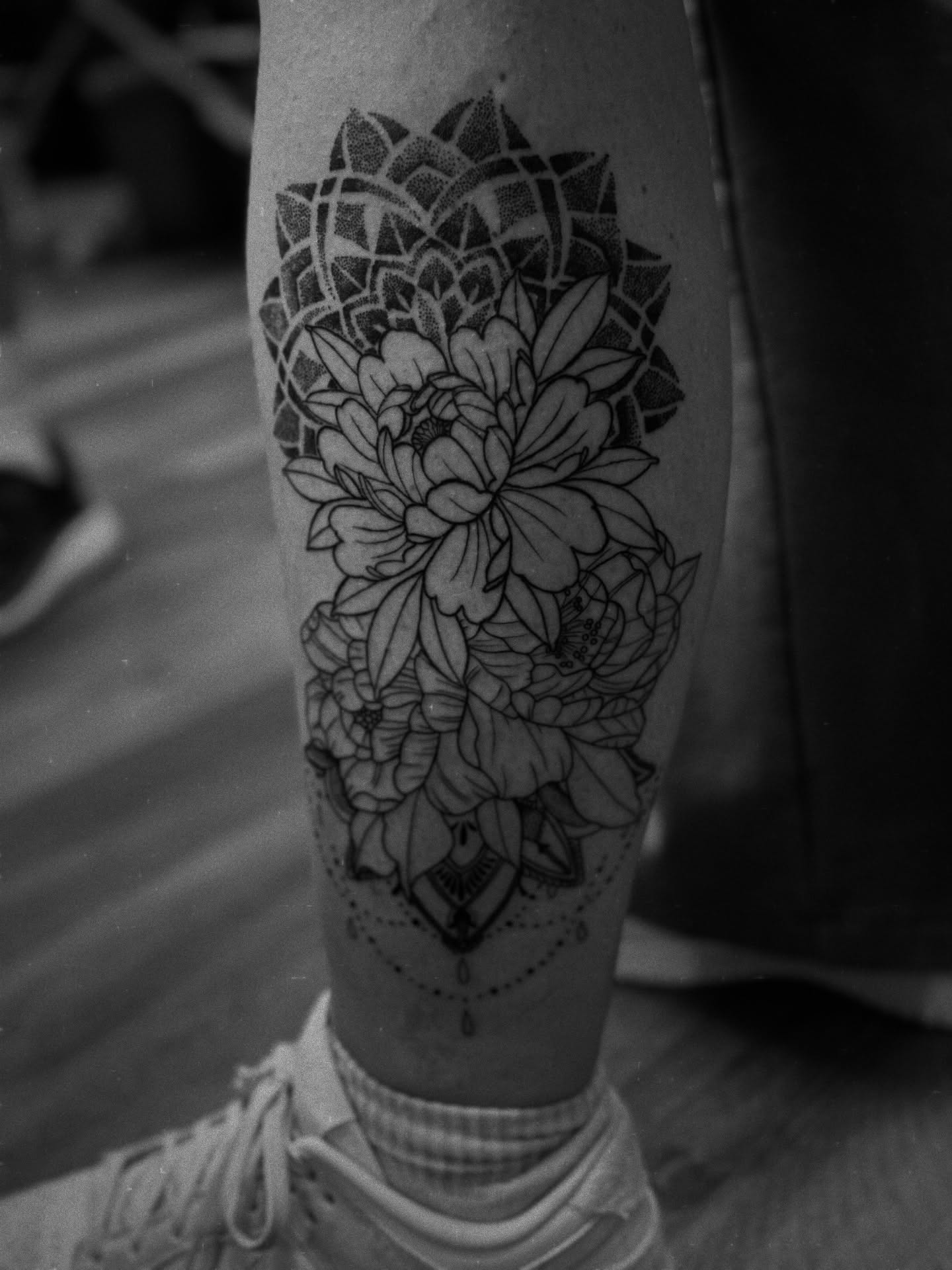 Floral mandala geometric tattoo on the forearm by Gianna G