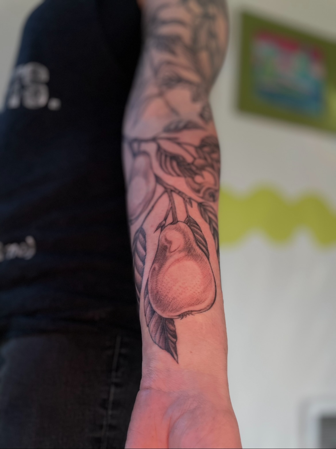 Pear realism tattoo on the forearm by Eryn, Portland, Oregon