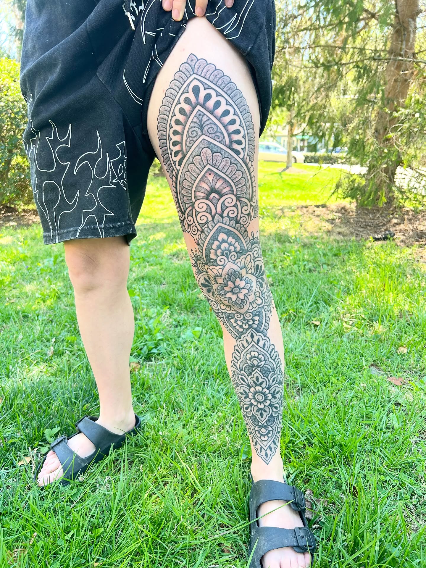 Floral mandala ornamental tattoo on the leg by Lauren Alexandra