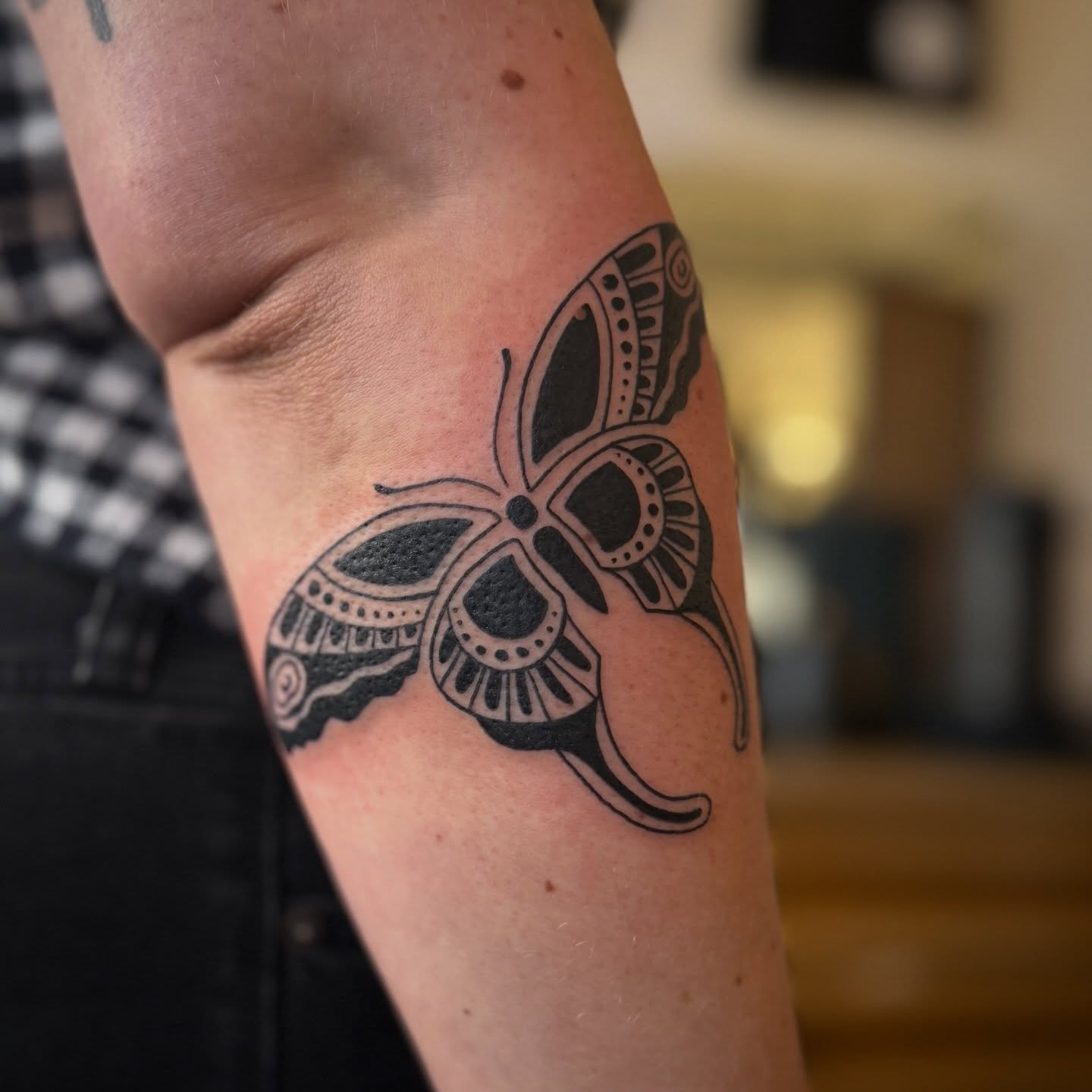 Butterfly black and grey tattoo on the forearm by Leah - Tattoo Artist