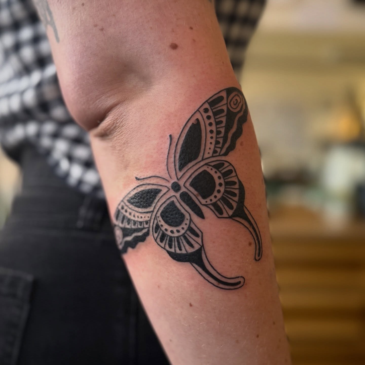 Butterfly black and grey tattoo on the forearm by Leah - Tattoo Artist