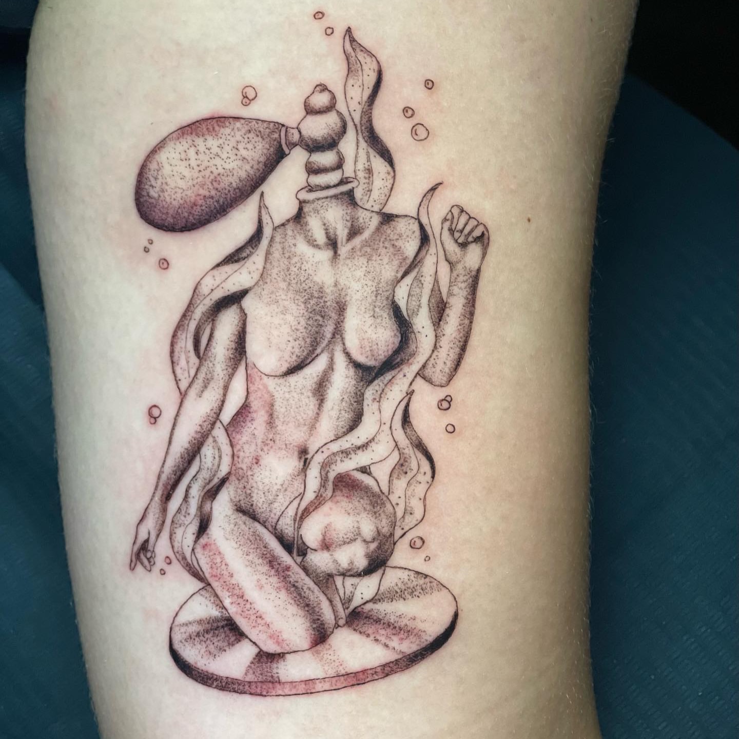 Female figure dotwork tattoo on the thigh by Brandie