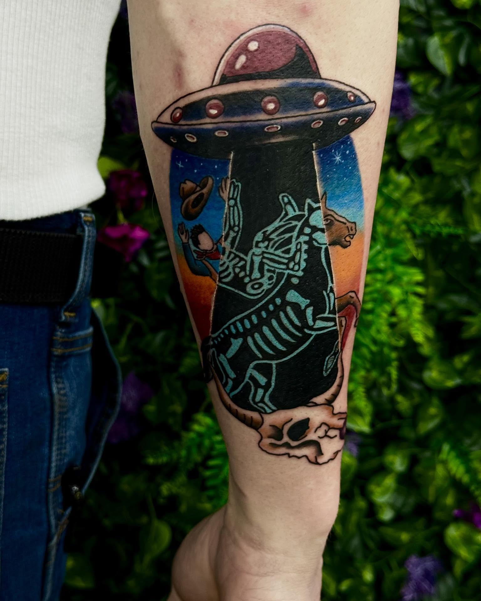 Space cowboy American traditional tattoo on the forearm by Sabrina