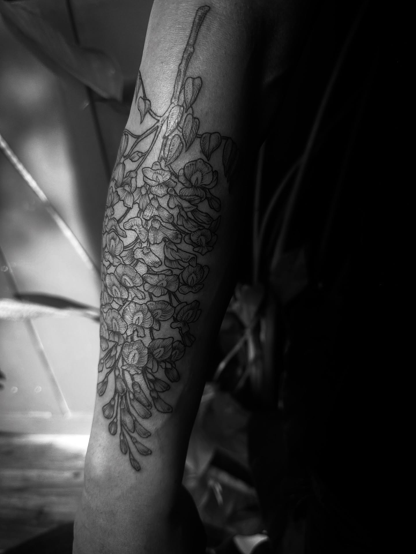 Flower bouquet black and grey tattoo on the forearm by Desireé Keys, Midvale, Utah