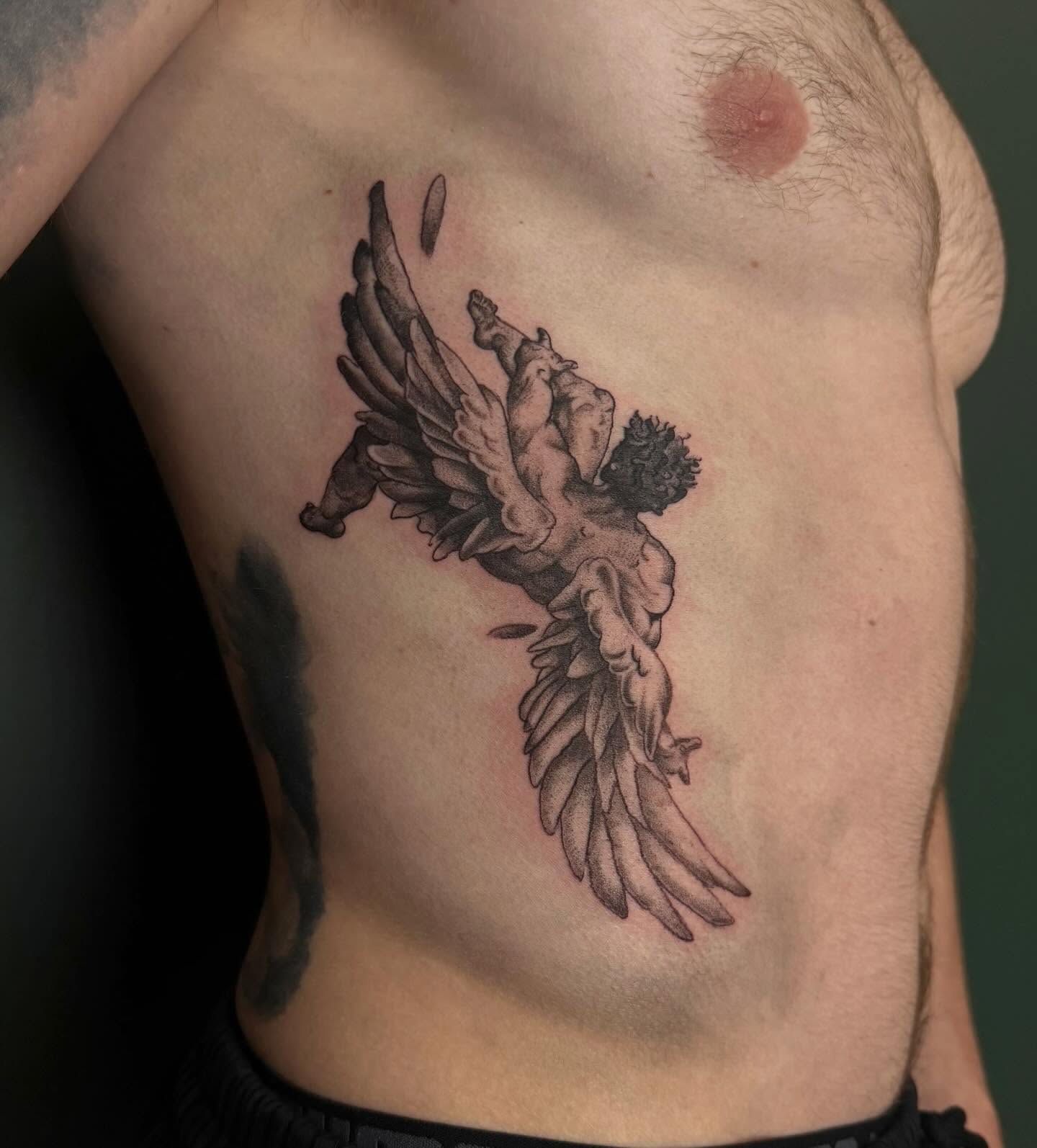 Angel black and grey tattoo on the ribs by Bailee
