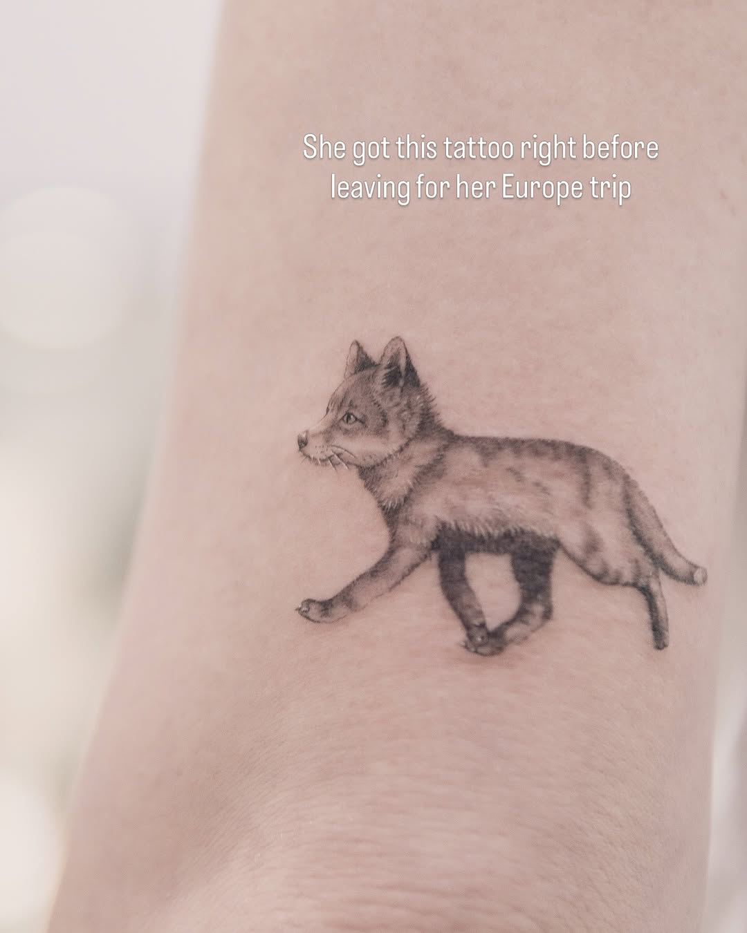 Running fox realism tattoo on the forearm by Joey