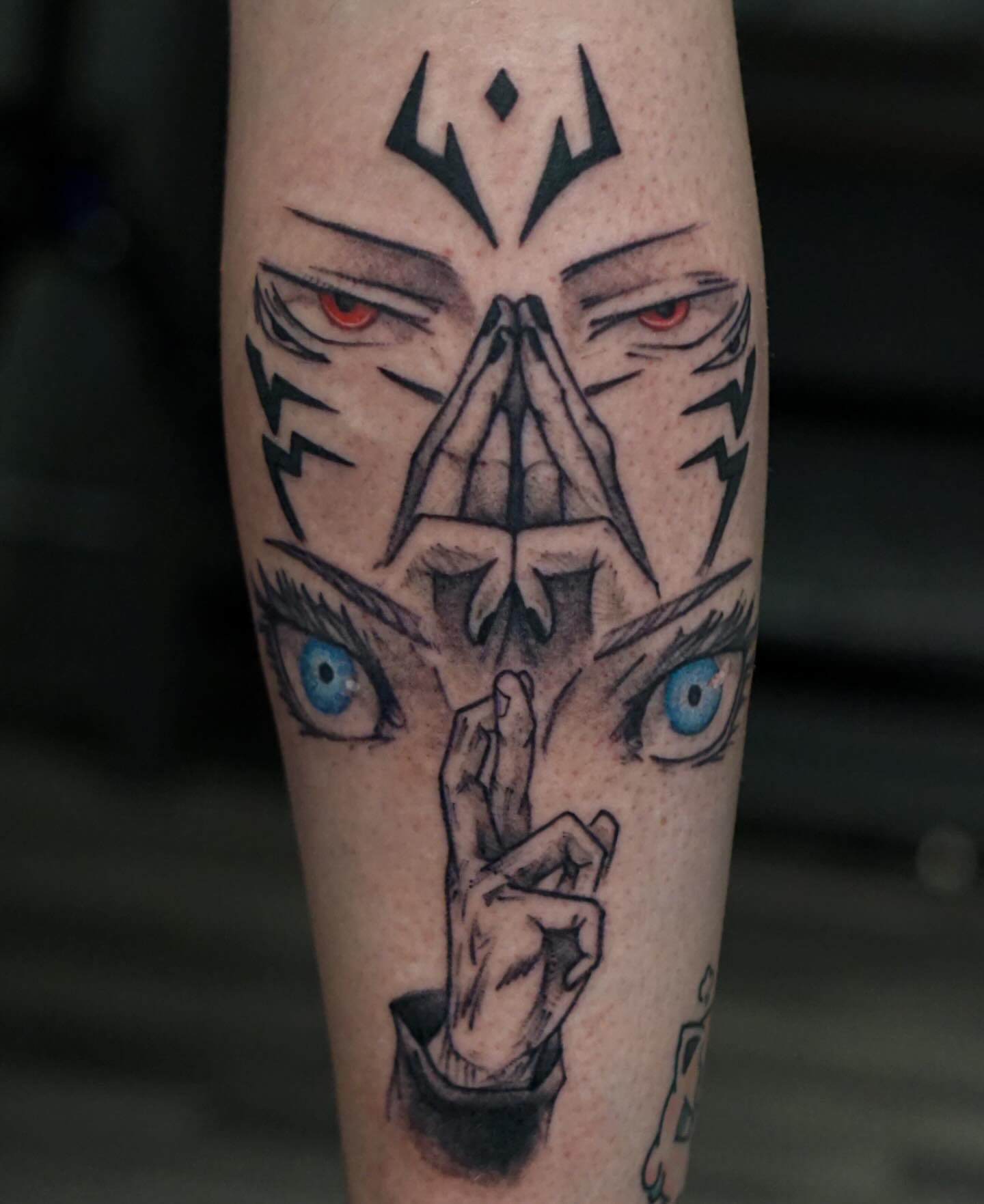 Praying hands with eyes geometric tattoo on the forearm by Nicholas Capellan, Winter Park, Florida