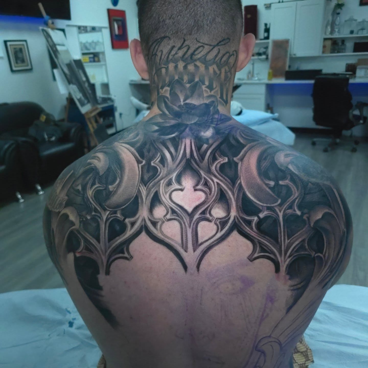 Lotus flower ornamental tattoo on the back by Joseph J Tattooart Denver, Lakewood, Colorado