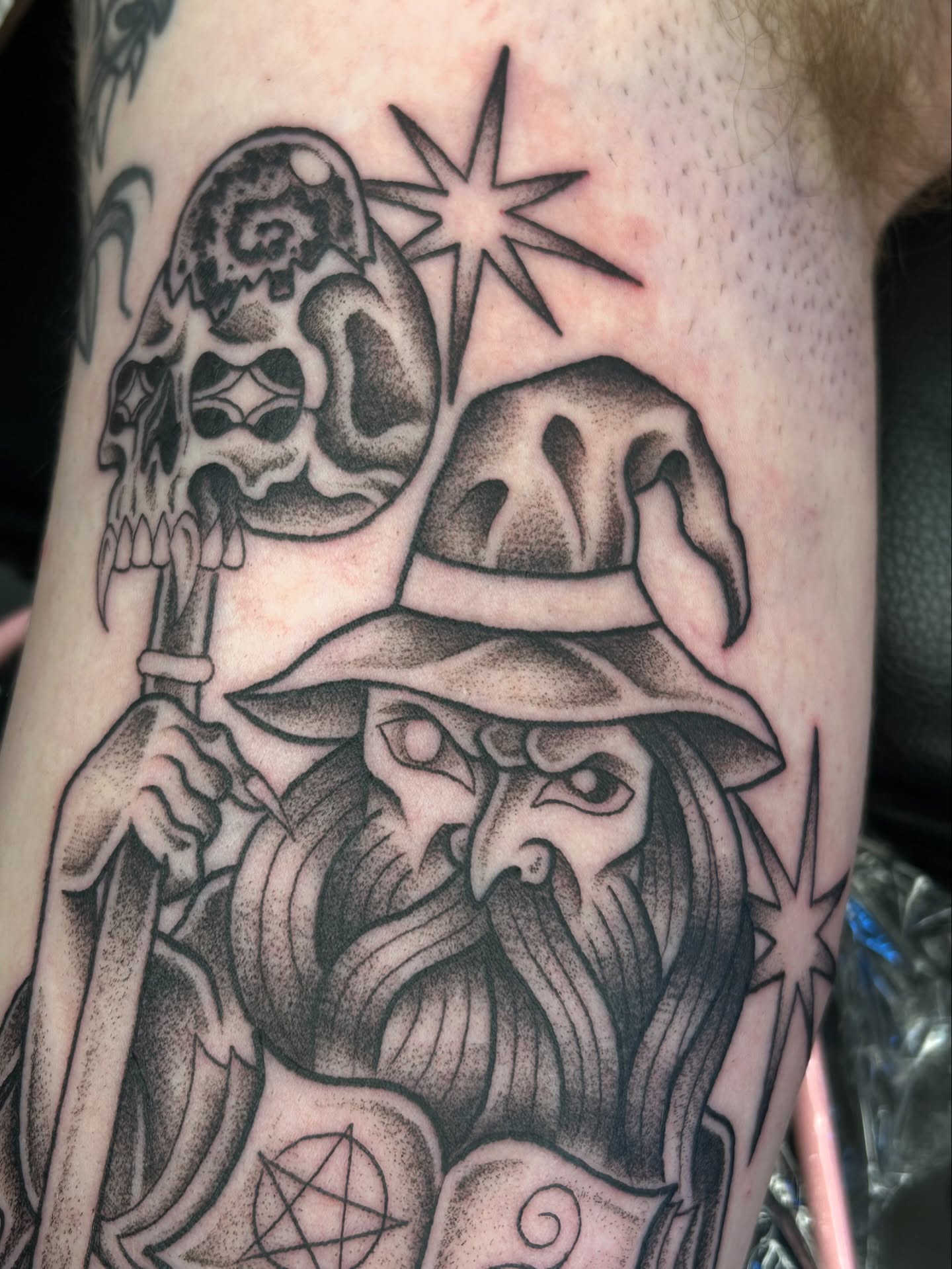 Wizard and skull dotwork tattoo on the forearm by Audrey Migitsch