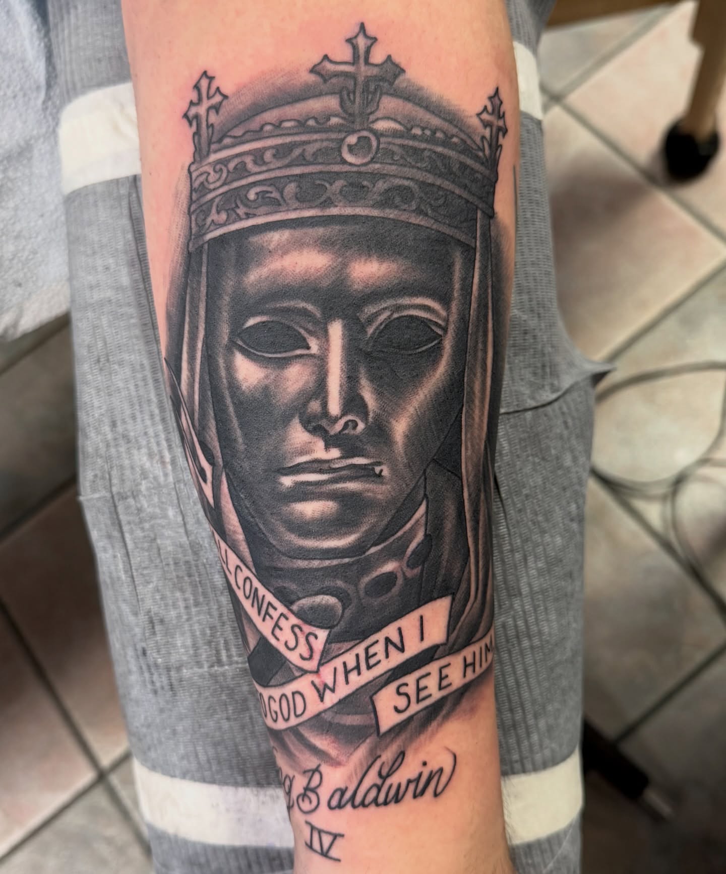 King realism tattoo on the forearm by Corey Thompson, Butler, Pennsylvania