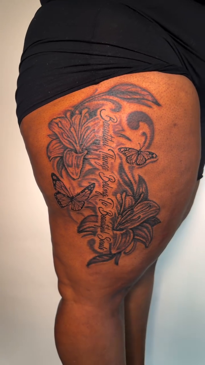 Lilies and butterflies realism tattoo by Justin custard Tattoo💉Artist 🎨Painter