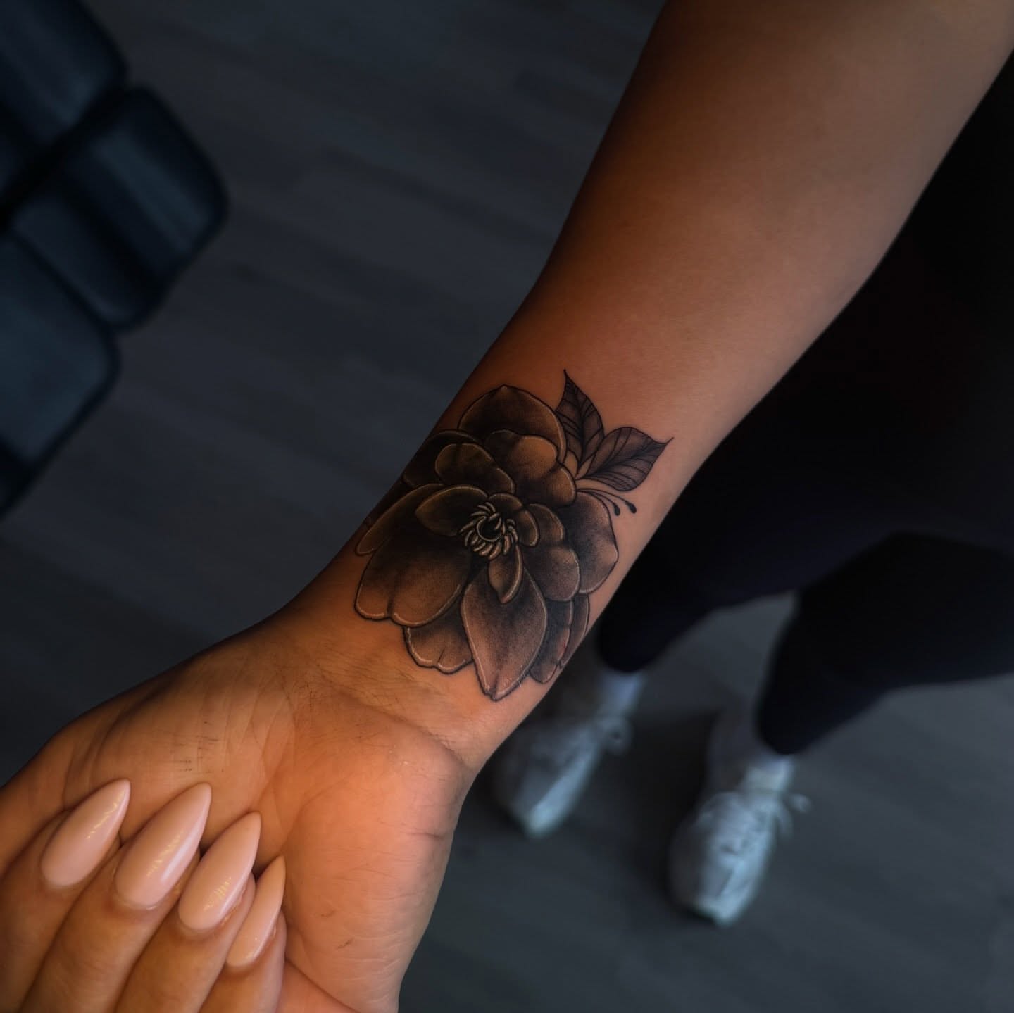 Flower black and grey tattoo on the forearm by Austin Tattoo Artist💉