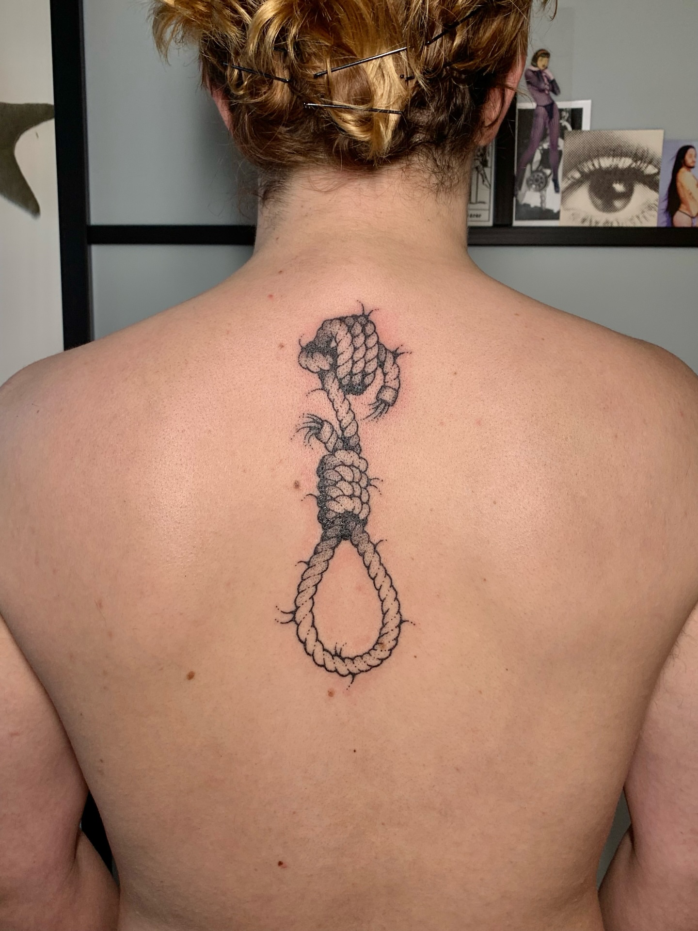 Hangman's noose black and grey tattoo on the back by Lex Lloyd