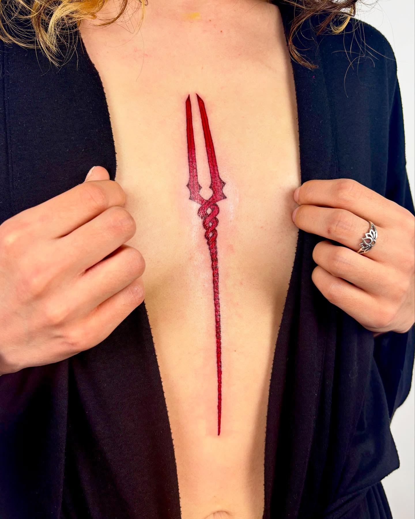 Arrow geometric tattoo on the ribs by kendle