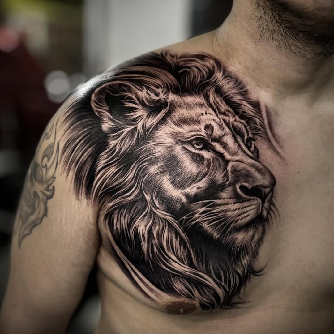 Lion portrait realism tattoo on the chest by ๐๐๐๐๐๐๐ ๐ฌ.๐ผ
