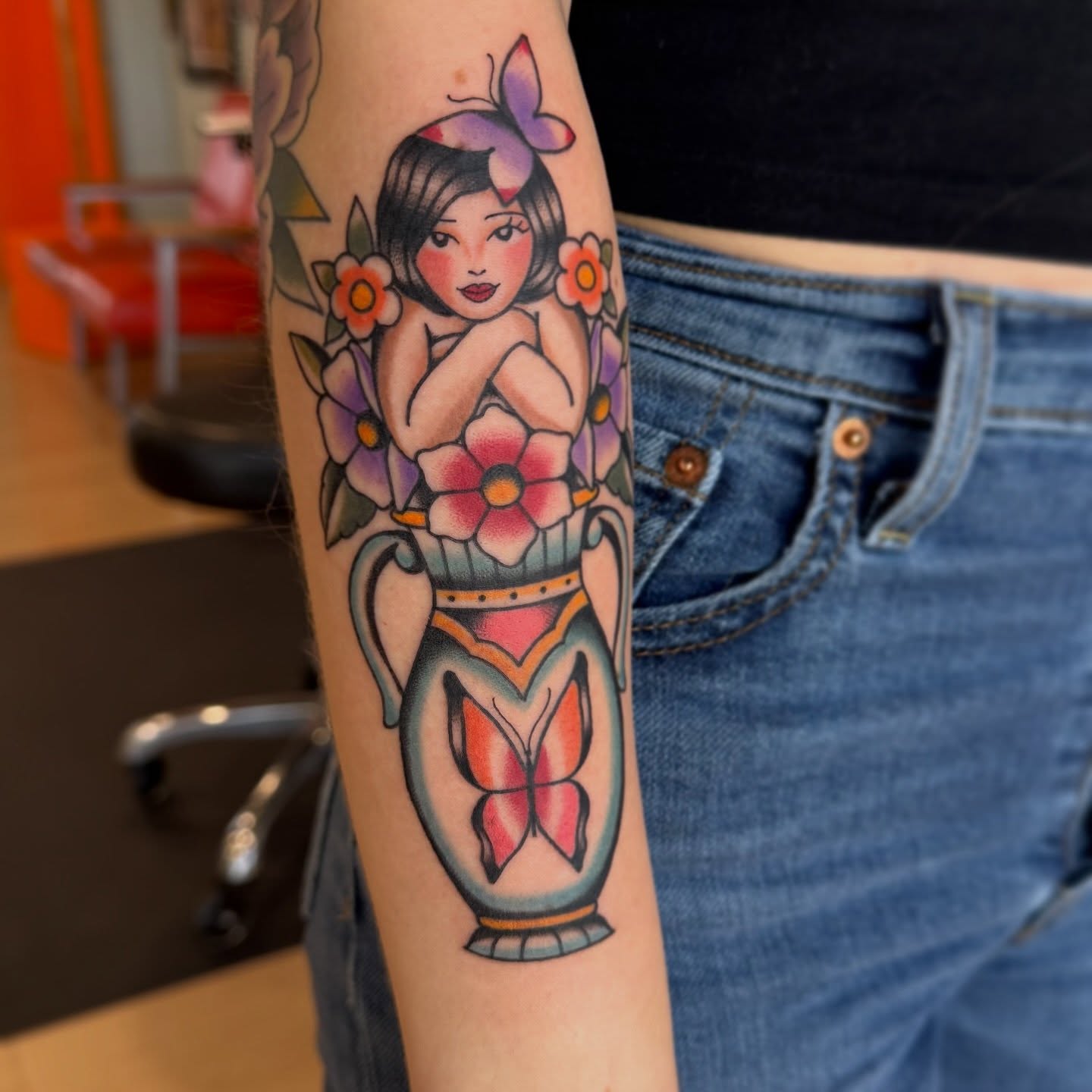 Flower fairy American traditional tattoo on the forearm by Kaley, Des Moines, Iowa