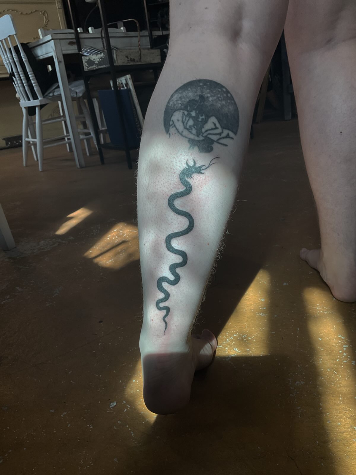 Snake and woman black and grey tattoo on the calf by ๐ญ๐๐๐๐