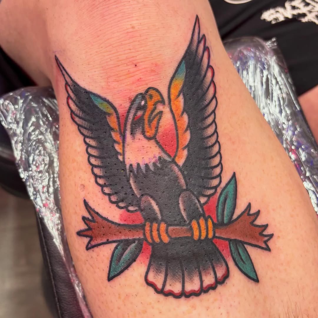 Eagle on a branch American traditional tattoo on the forearm by @dannydoestattoos
