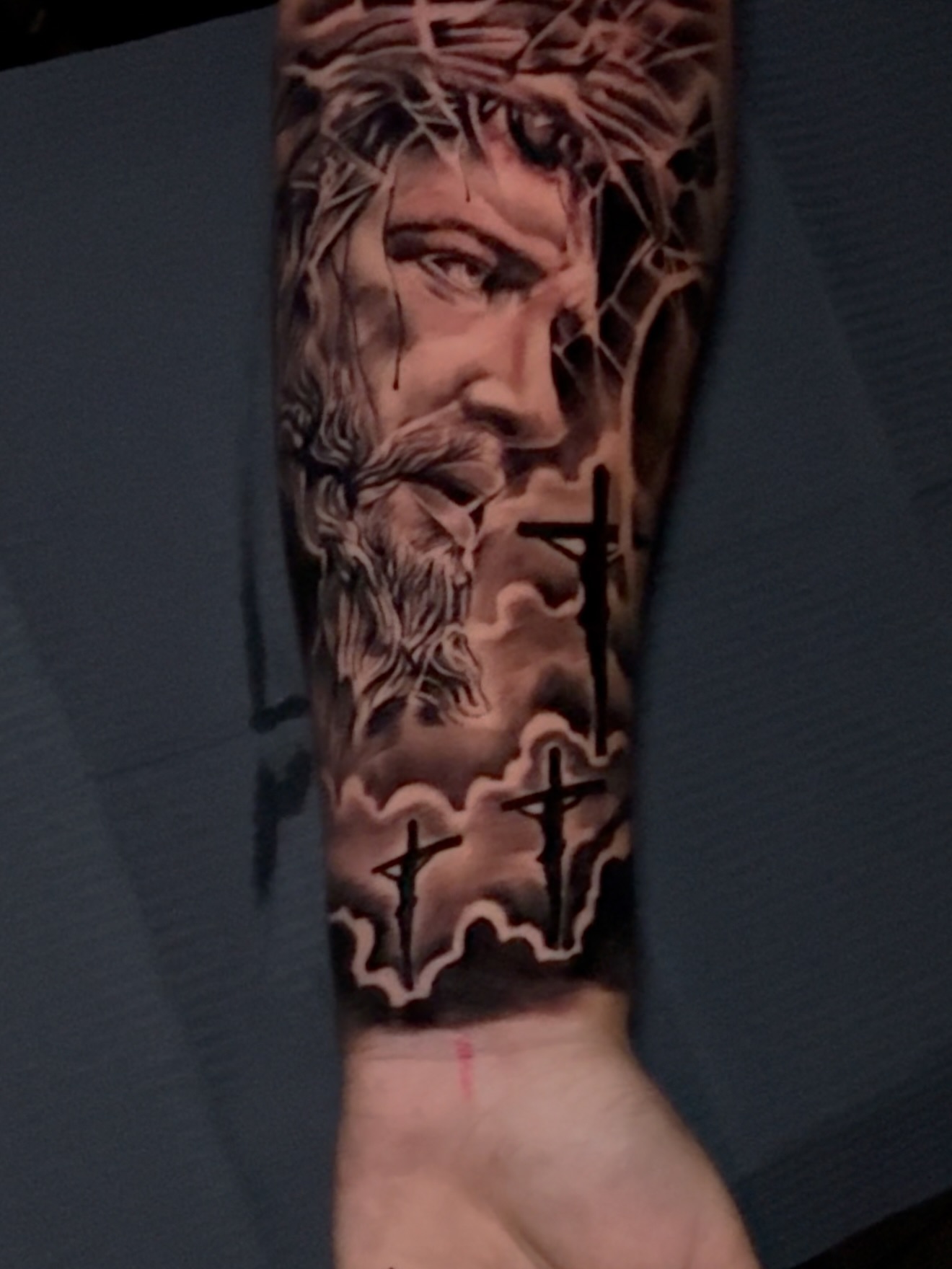 Religious figure realism tattoo on the forearm by Erick @ AZTEC_TATT
