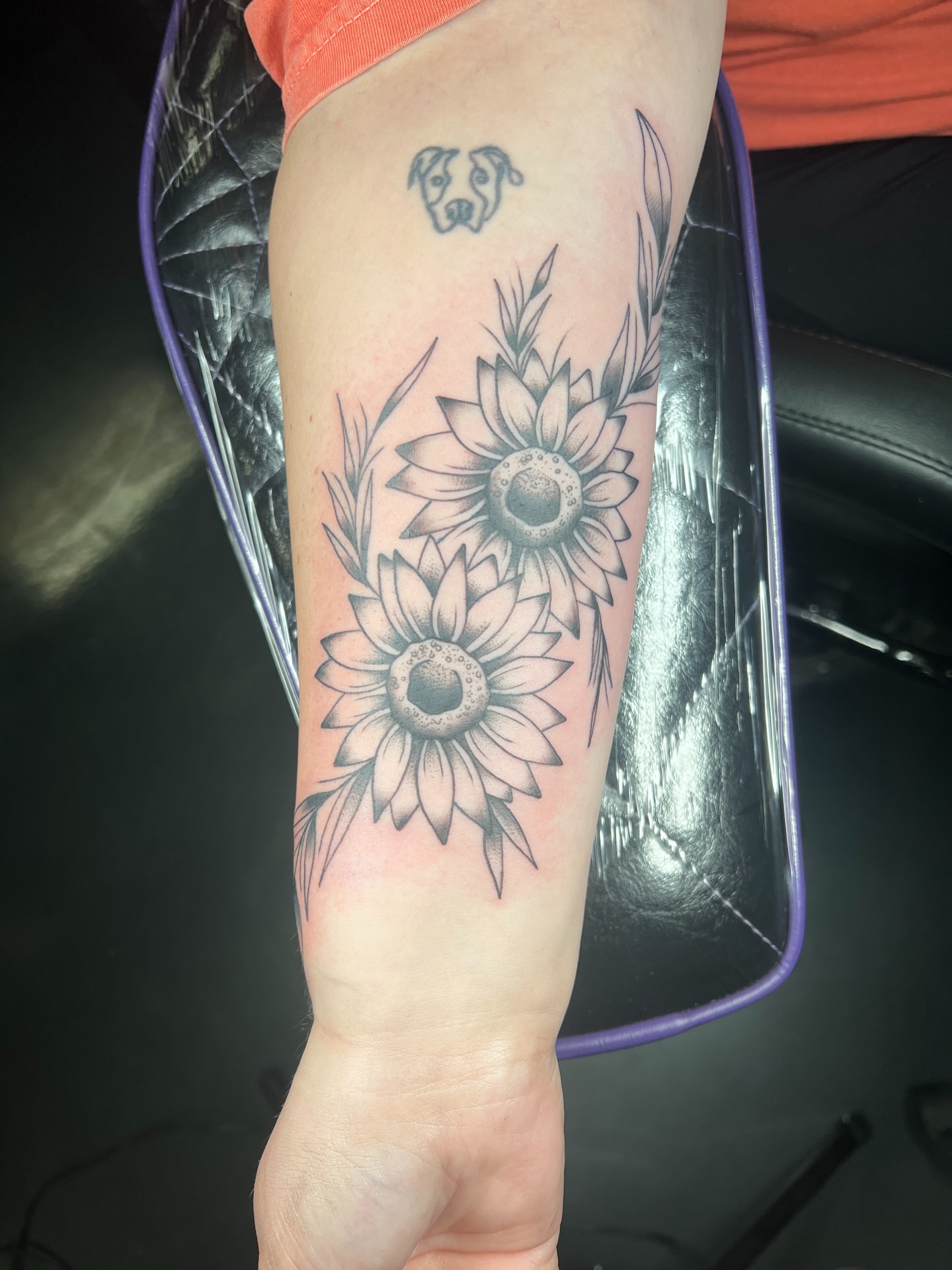 Sunflowers black and grey tattoo on the forearm by Brian Mock