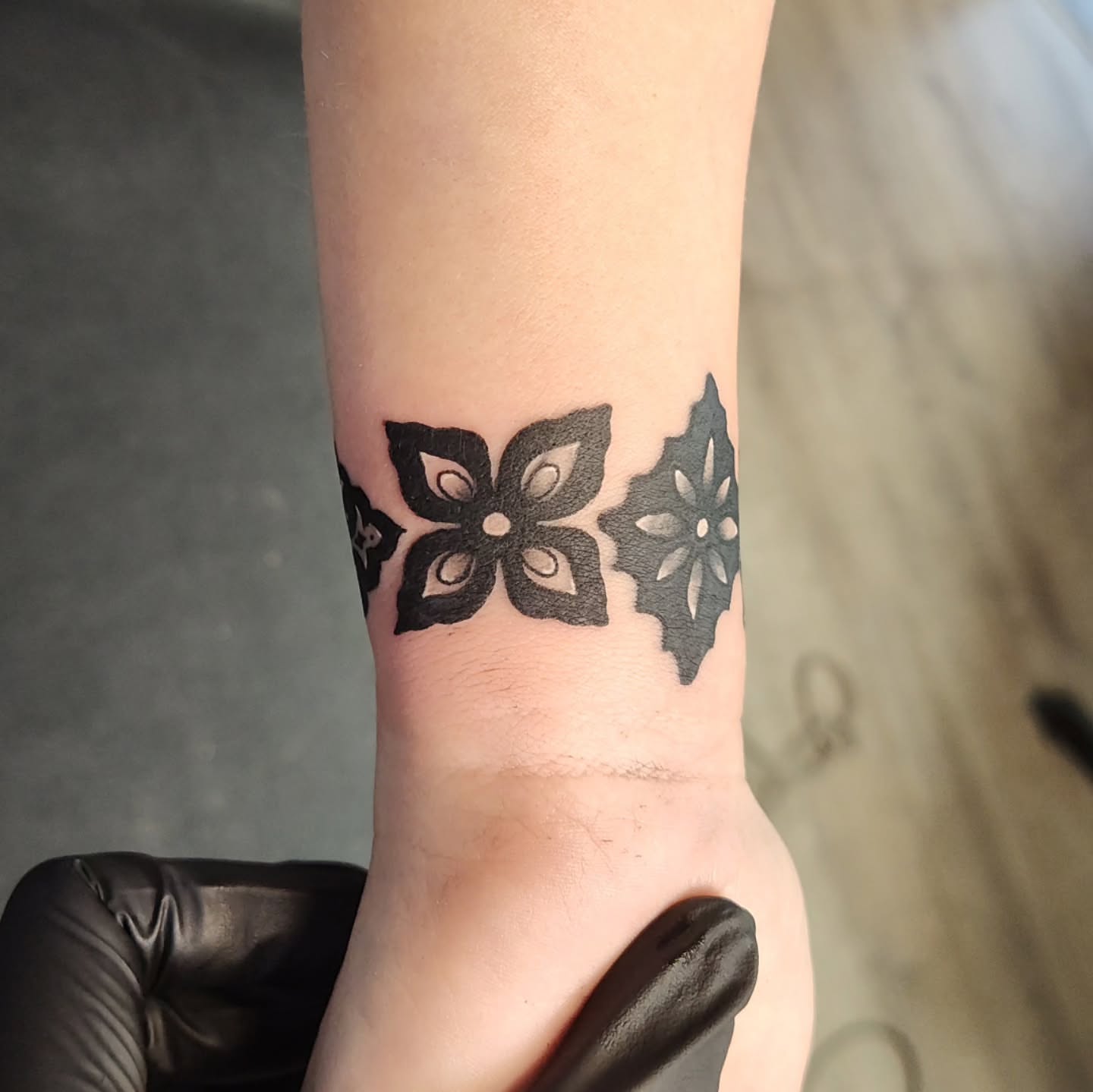 Geometric pattern geometric tattoo on the forearm by Mercury