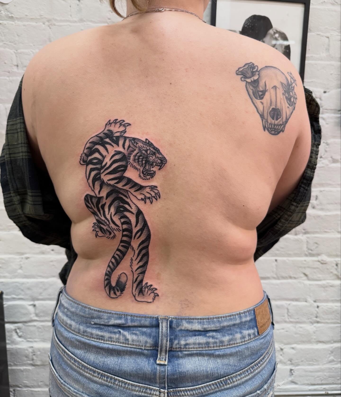 Tiger black and grey tattoo on the back by CAT