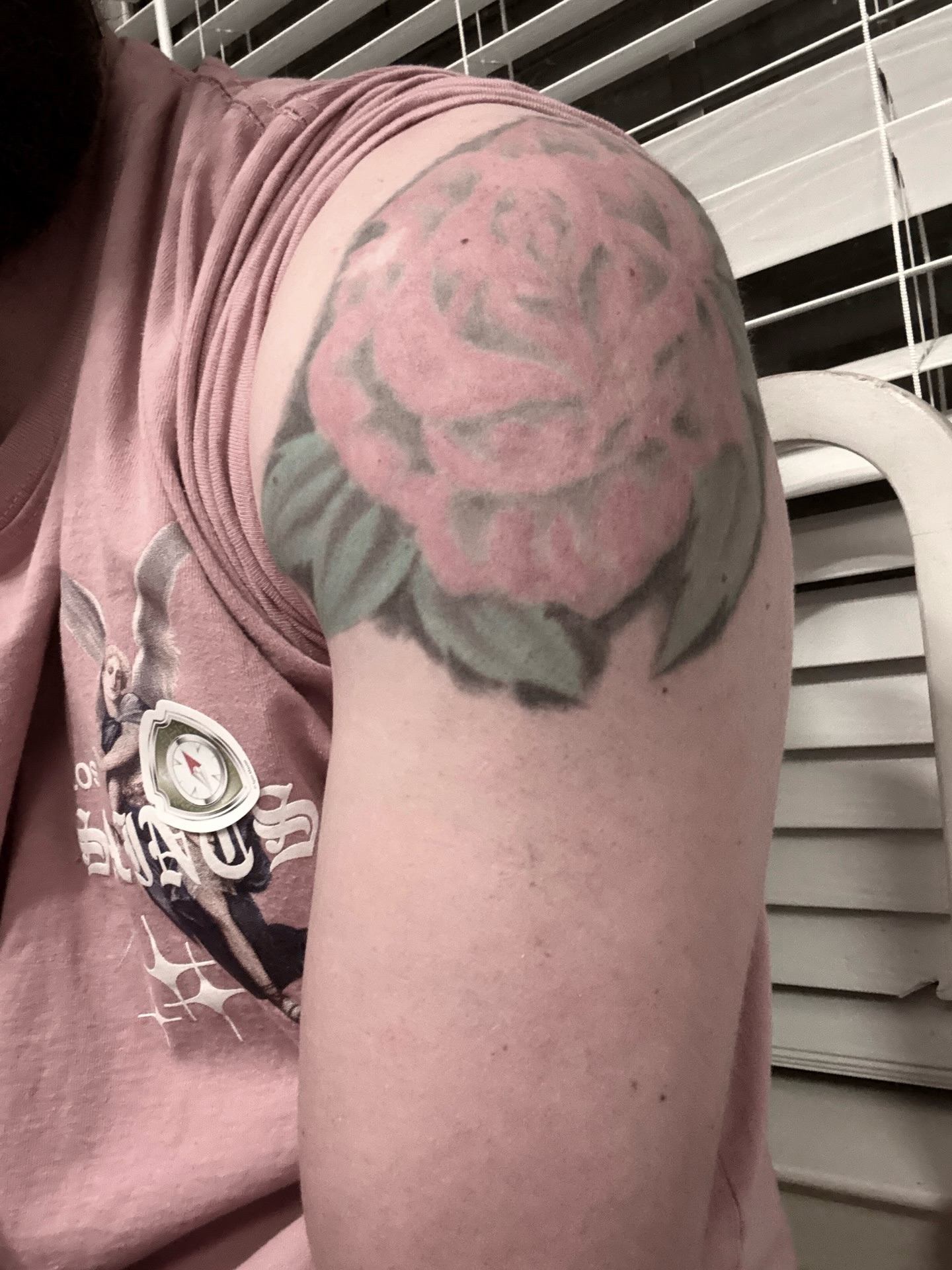 Rose realism tattoo on the shoulder by Emersyn DeLuna