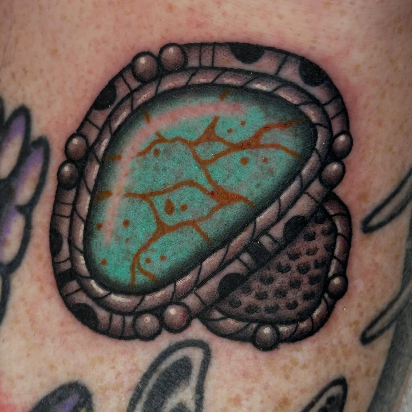Gemstone dotwork tattoo on the forearm by Kyle Logan Frary