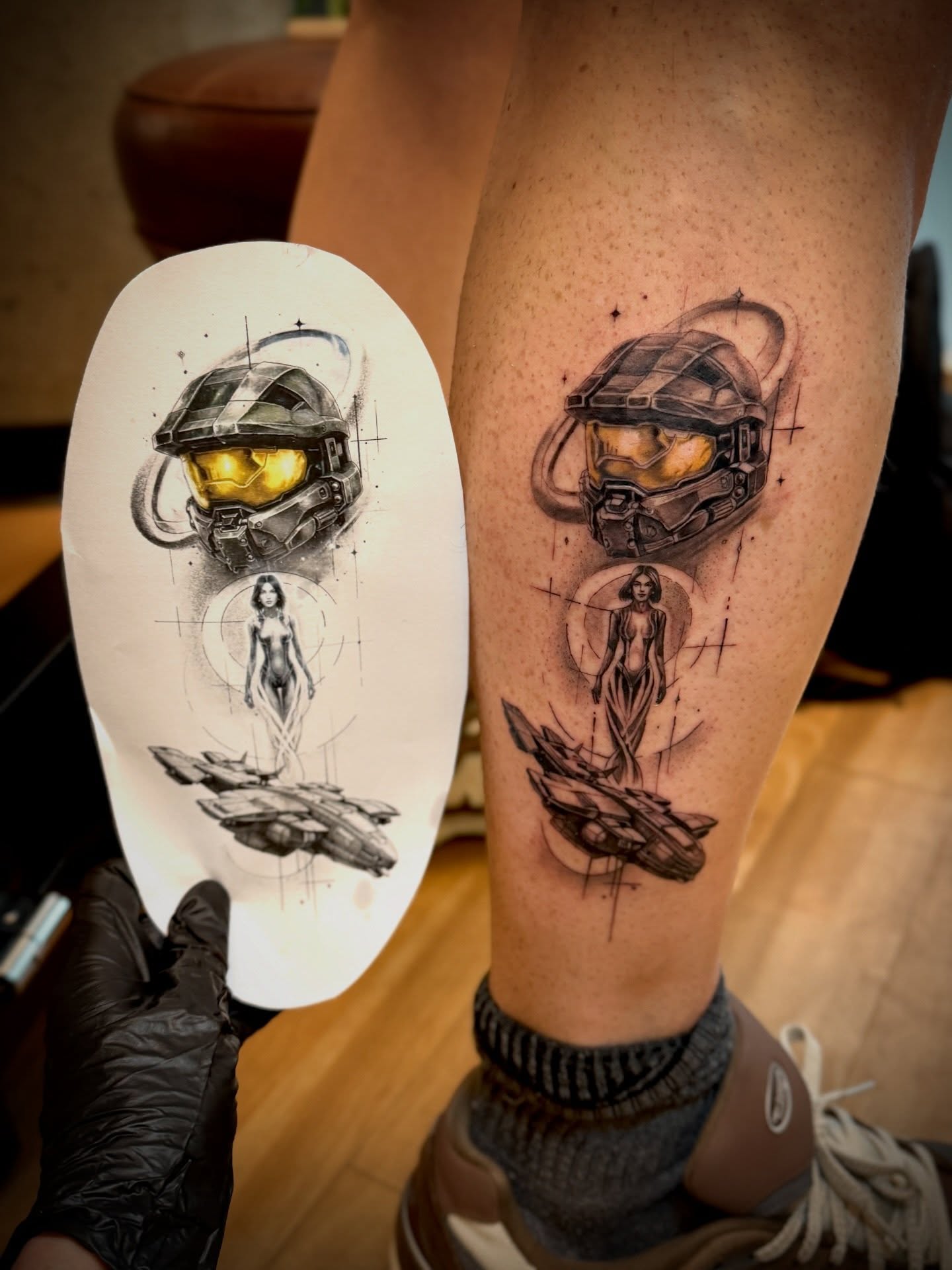 Master chief helmet realism tattoo on the thigh by Aristova Anastasia