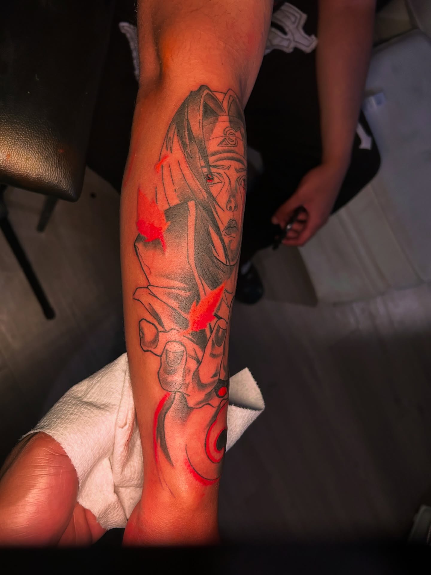 Anime character anime tattoo on the forearm by Tito Cross ❤️‍🔥