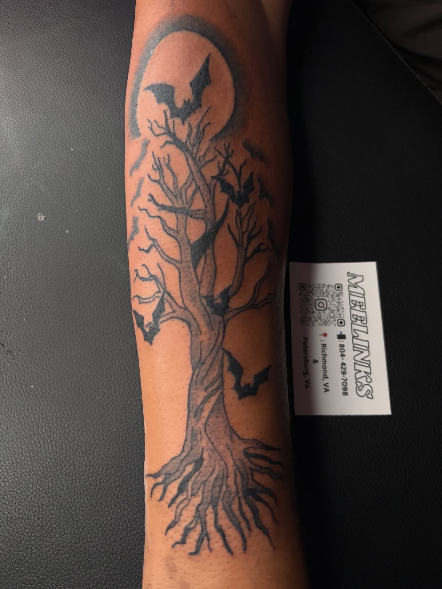 Tree with bats black and grey tattoo on the forearm by Meela Inks ๐, Richmond, Virginia