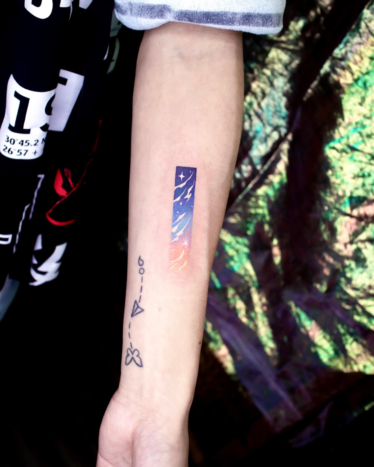 Space-themed design dotwork tattoo on the forearm by 밍꽈 타투